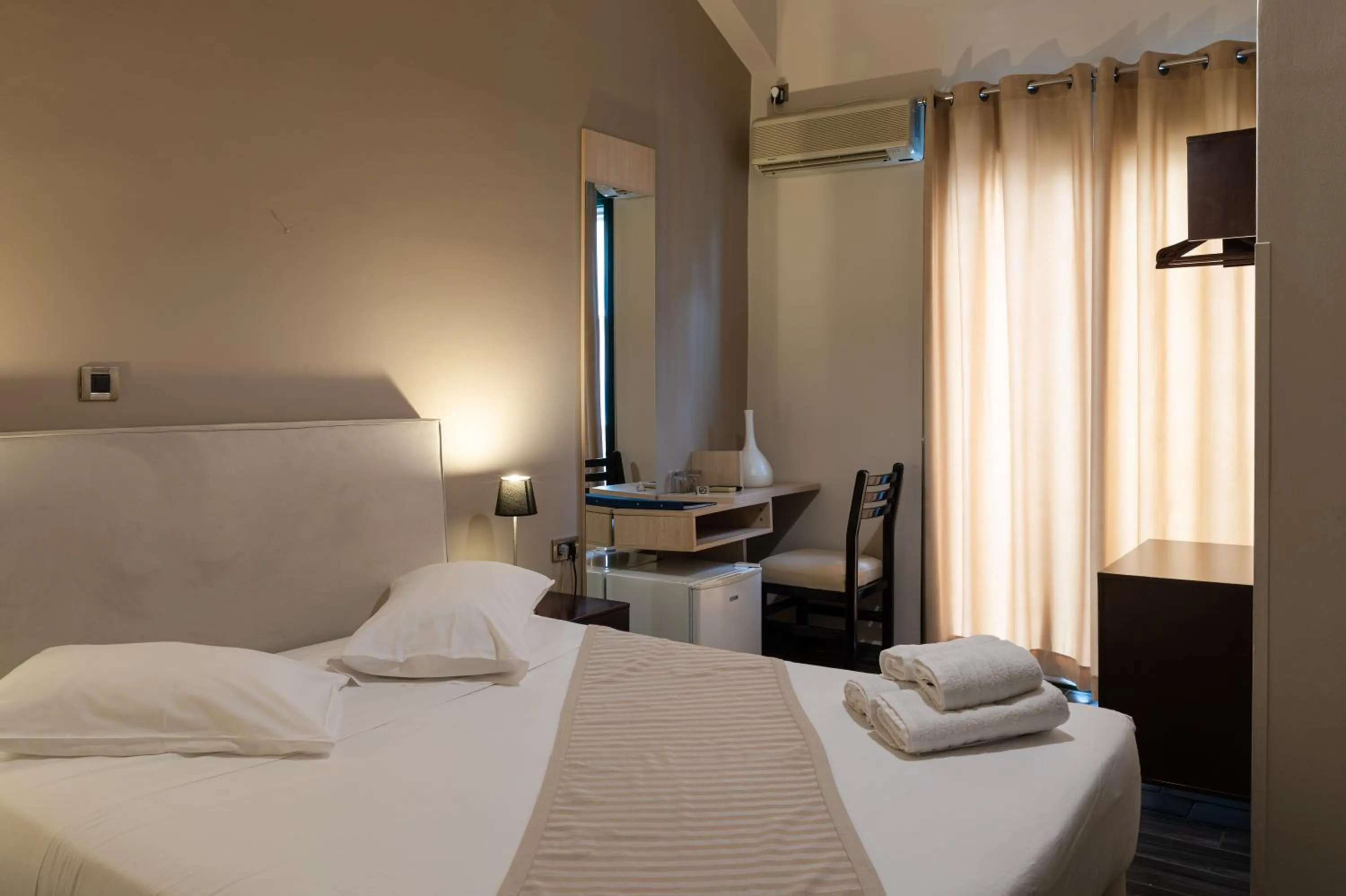 Photo of the whole room, Bed in Plaza Hotel