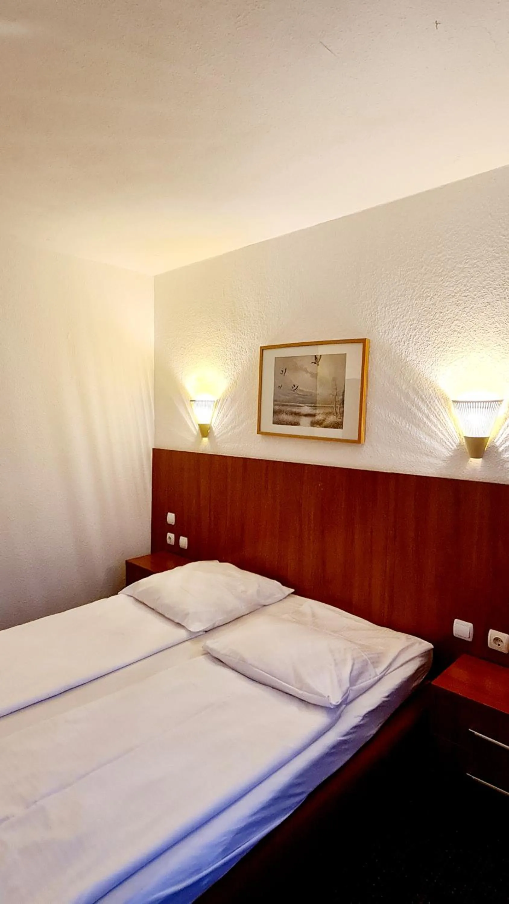 Bed in Hotel Zentrum