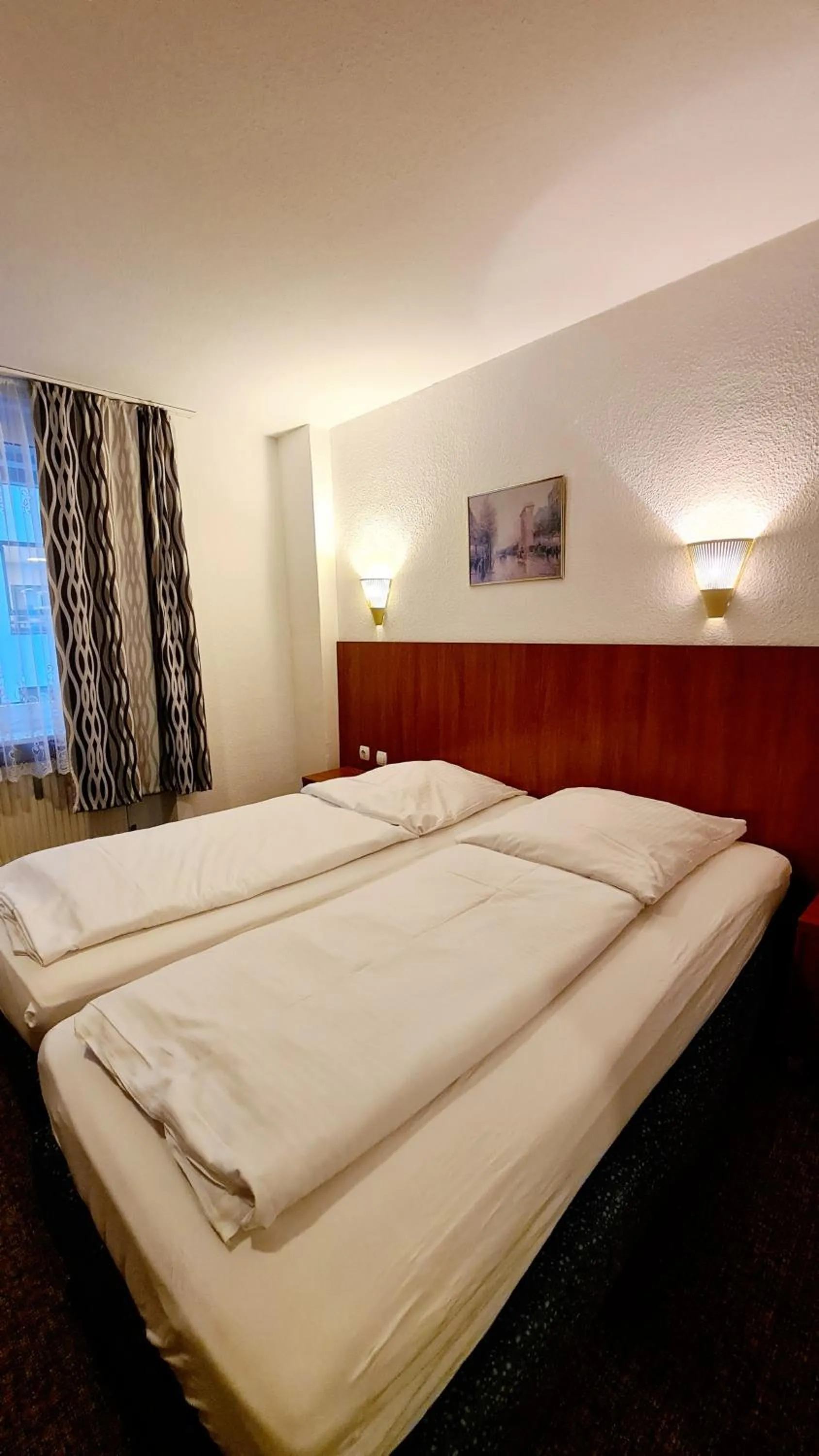 Bed in Hotel Zentrum