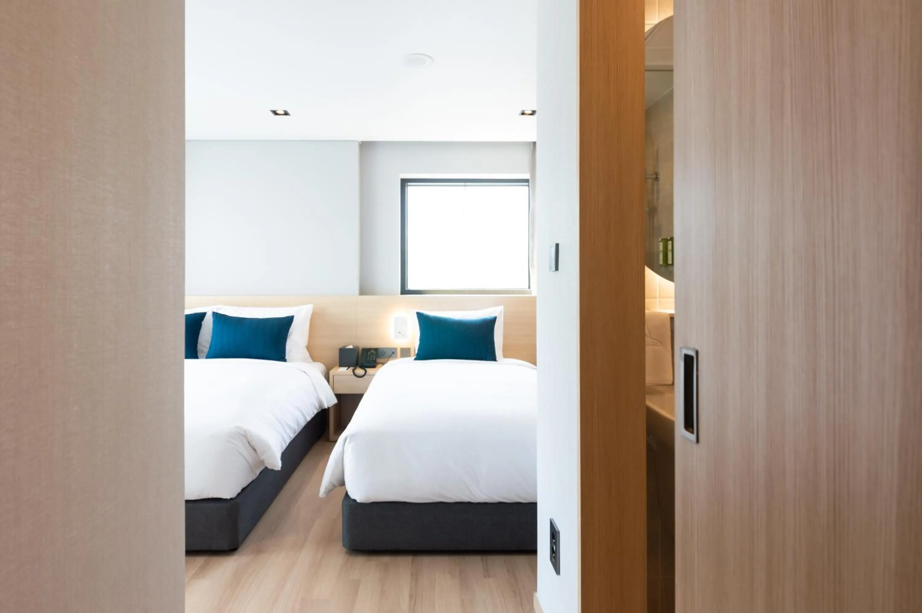 Bed in Connect Busan Hotel & Residence