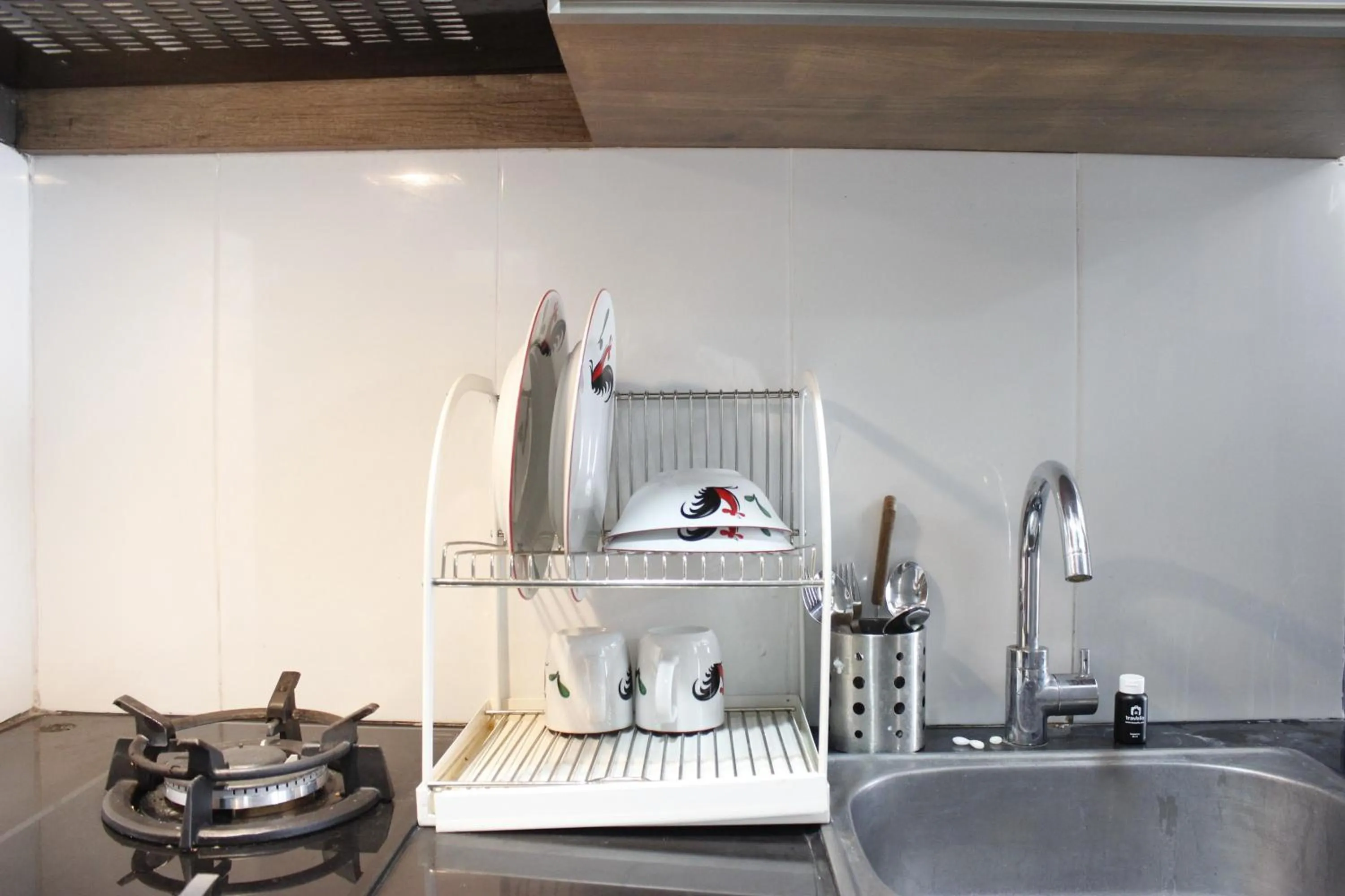 Kitchen or kitchenette in Artistic & Scenic Studio at Gateway Pasteur near Cimahi By Travelio