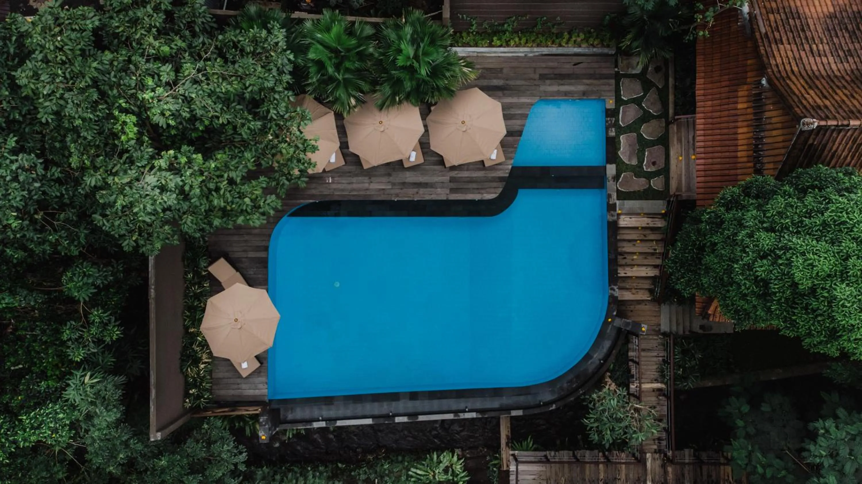 Swimming pool in Merak Village by Prasi