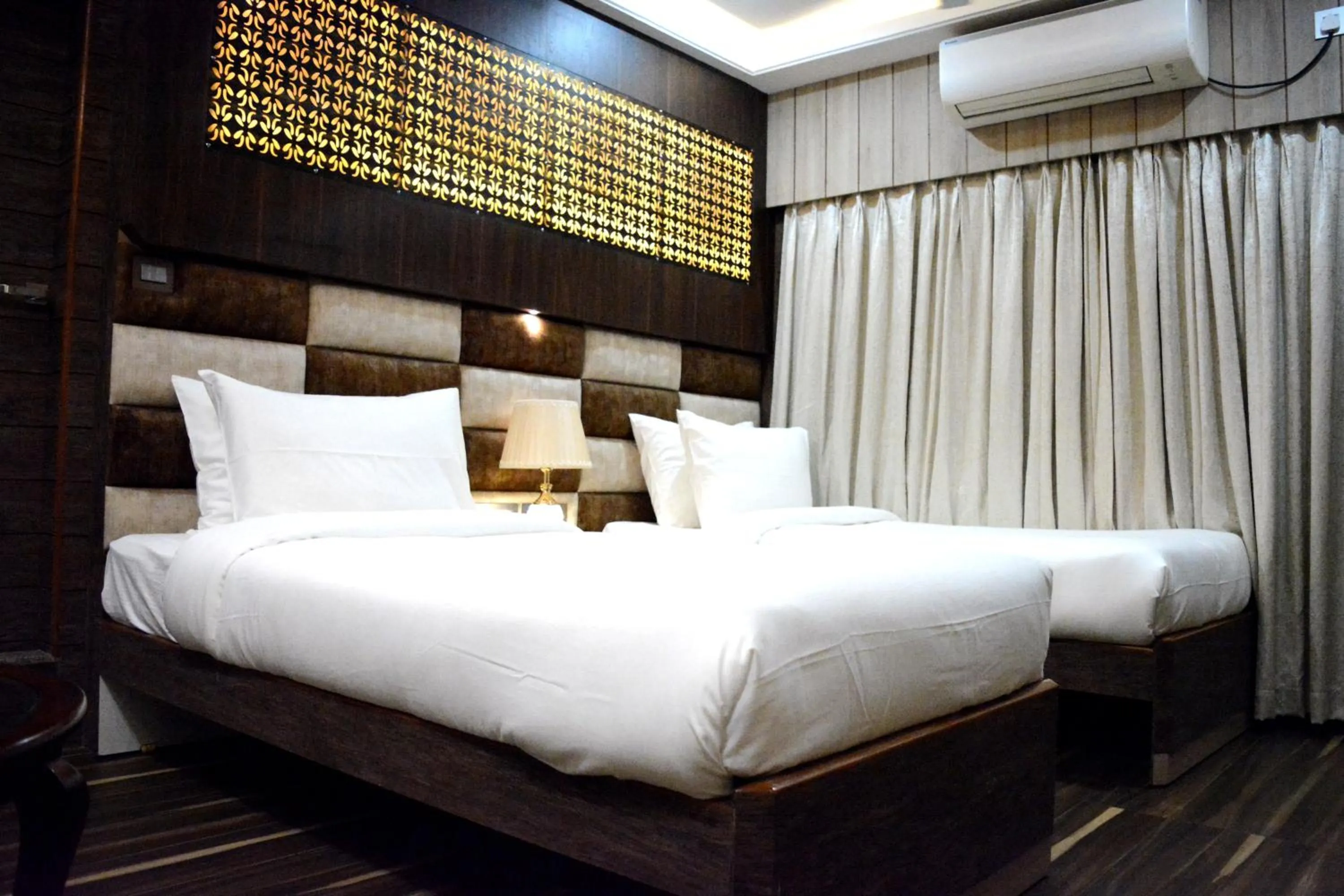 Bed in Hotel Aavas Inn