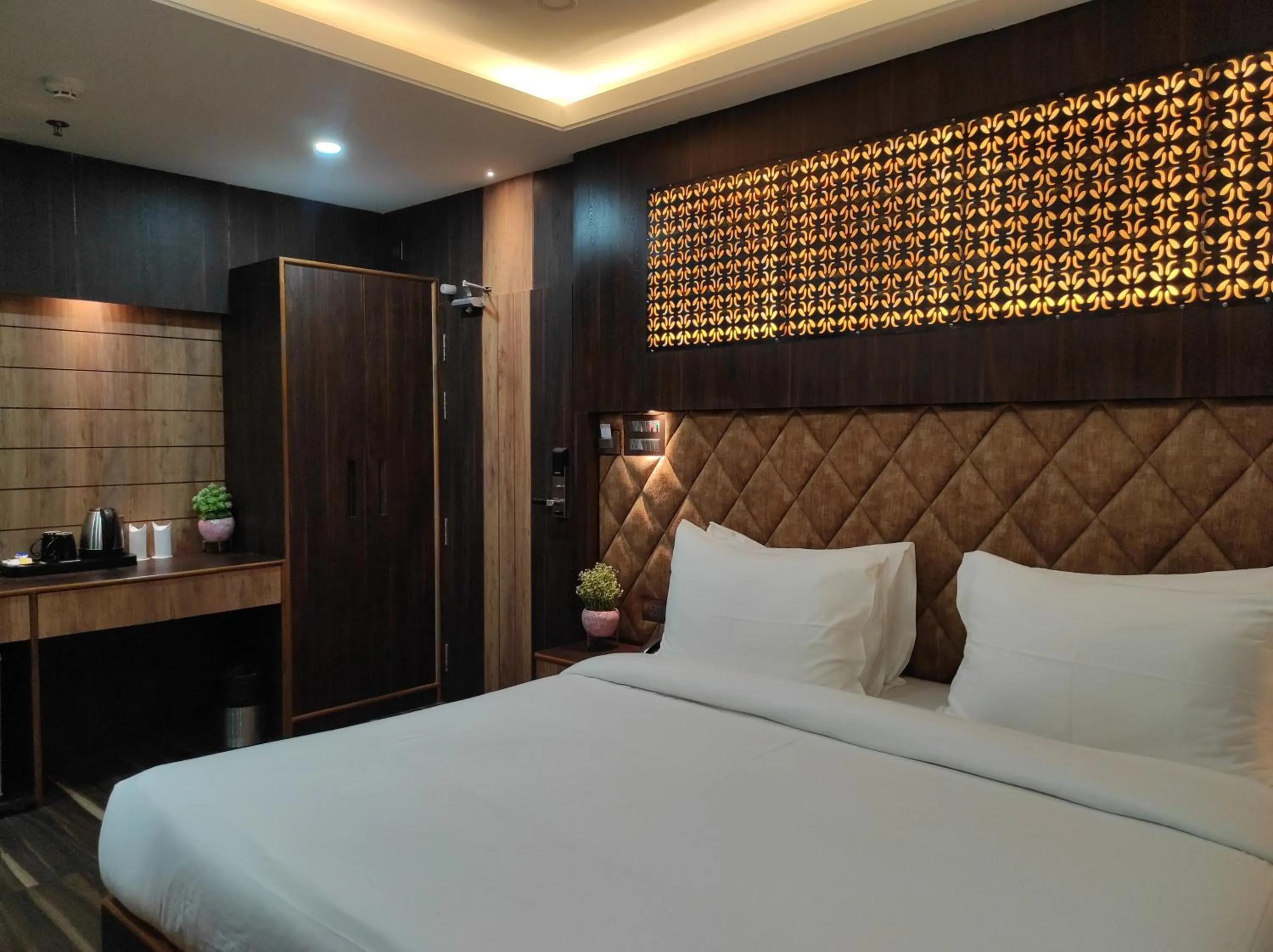 Bed in Hotel Aavas Inn