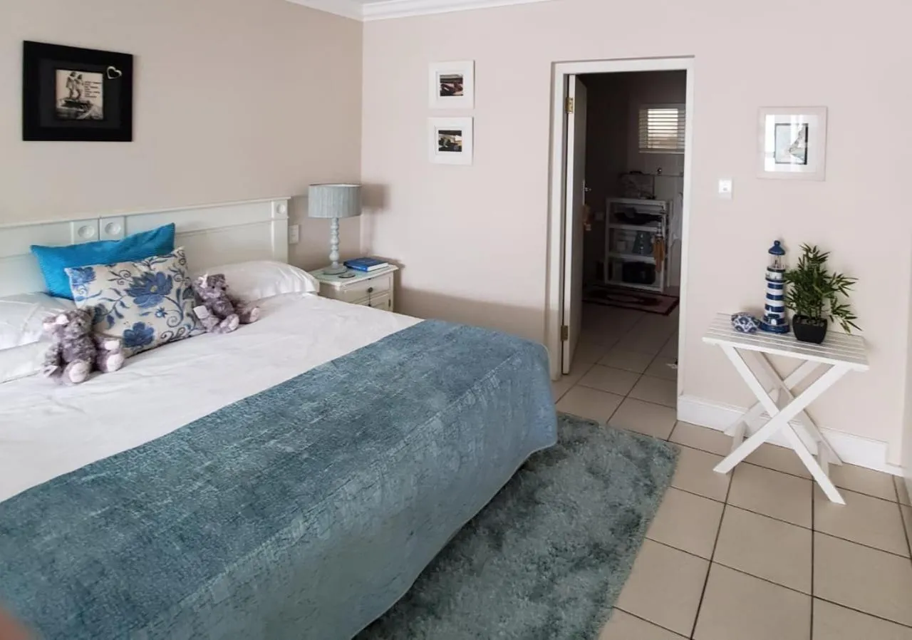 Bed in Gordon's Beach Lodge