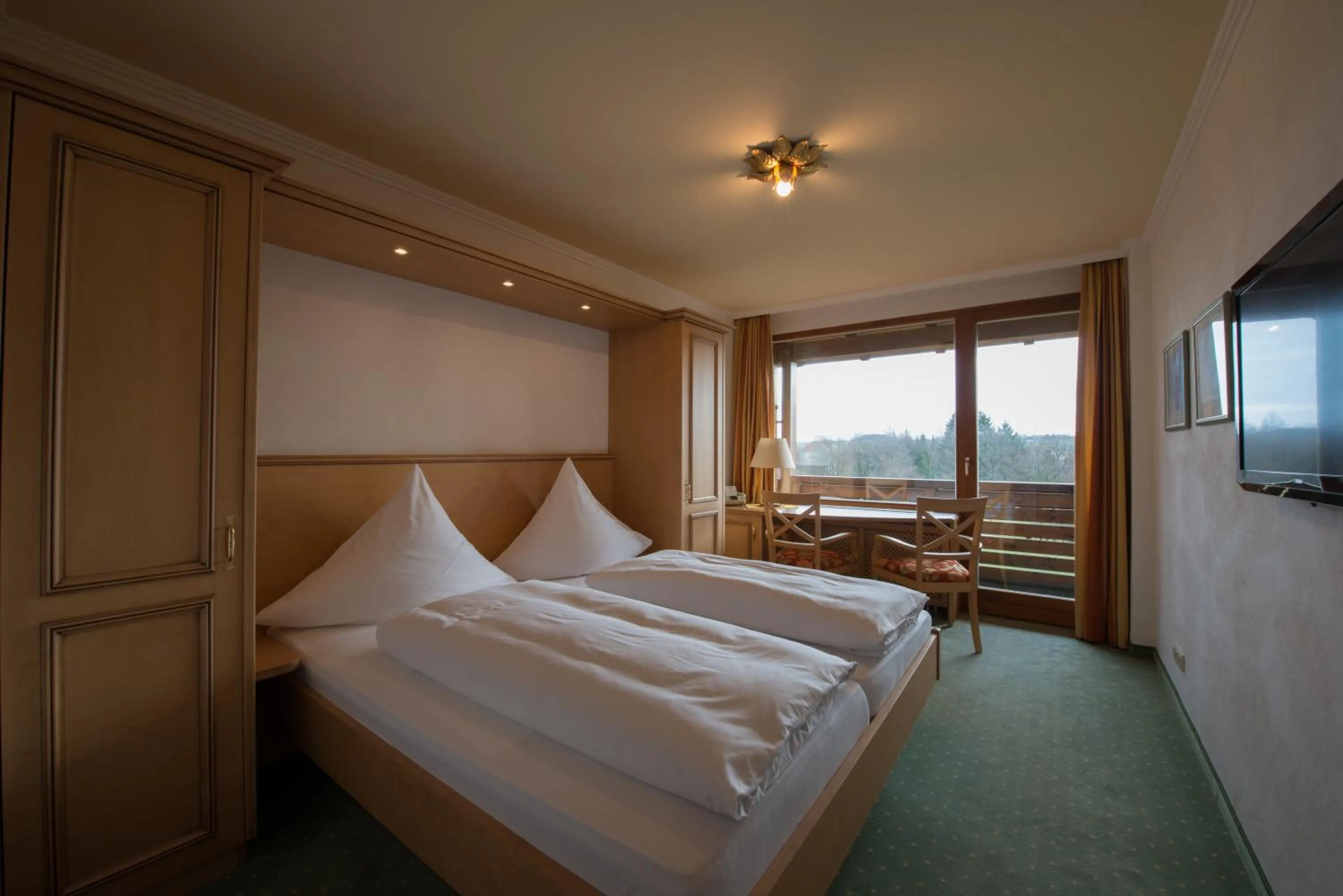 Photo of the whole room, Bed in Hotel St. Ulrich Garni