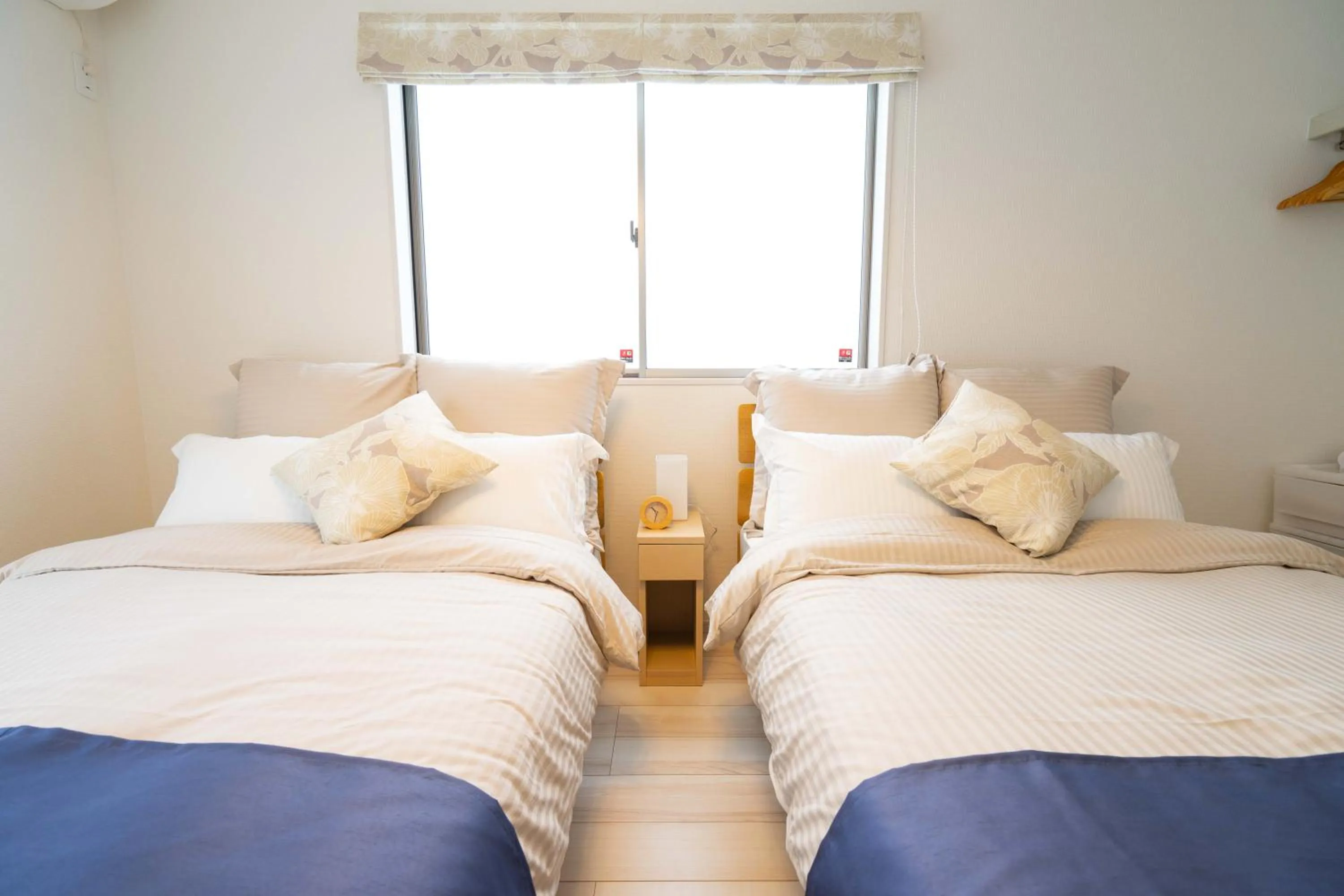 Photo of the whole room, Bed in OKINAWA BEACH HOUSE Golden Drop S