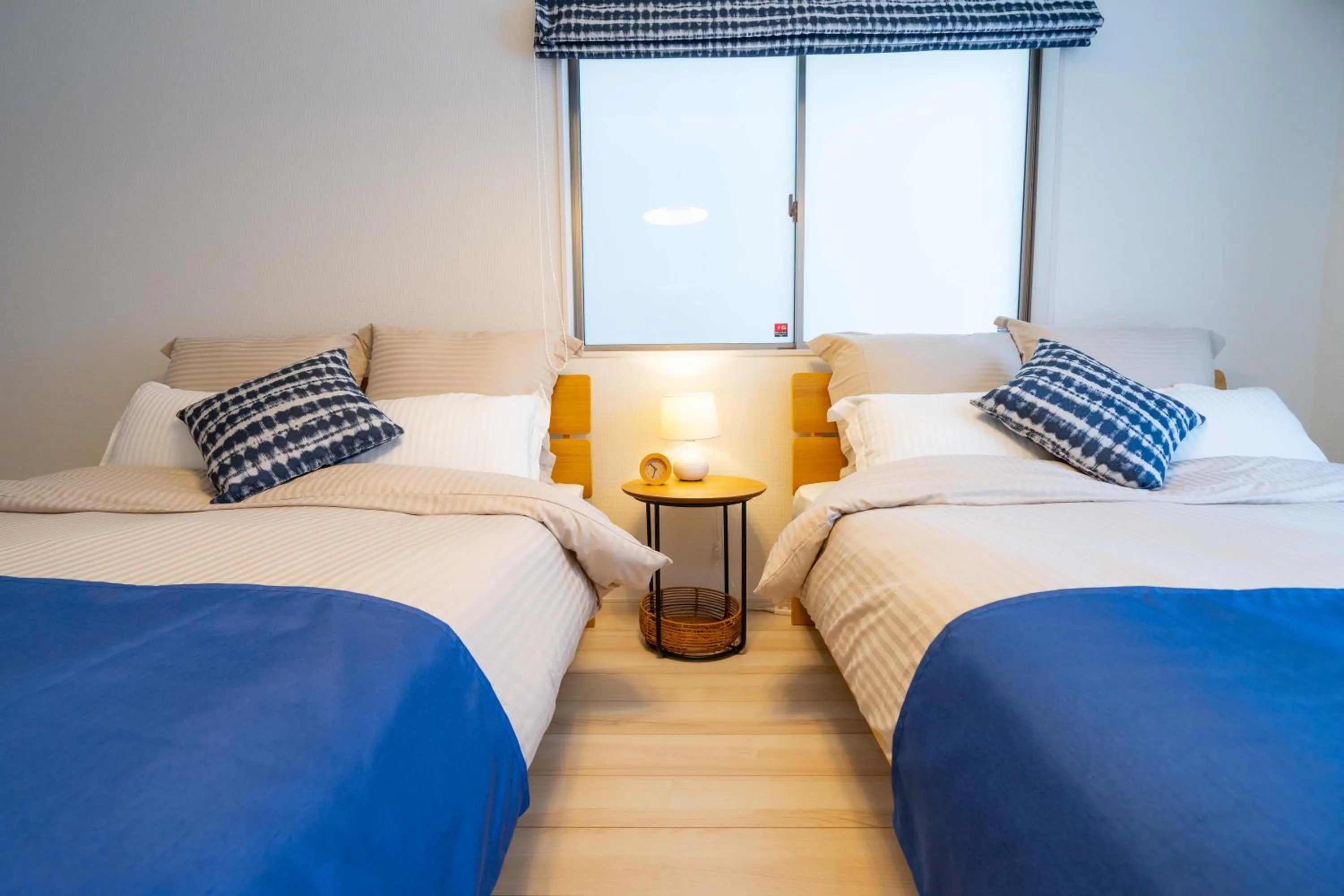 Photo of the whole room, Bed in OKINAWA BEACH HOUSE Golden Drop S