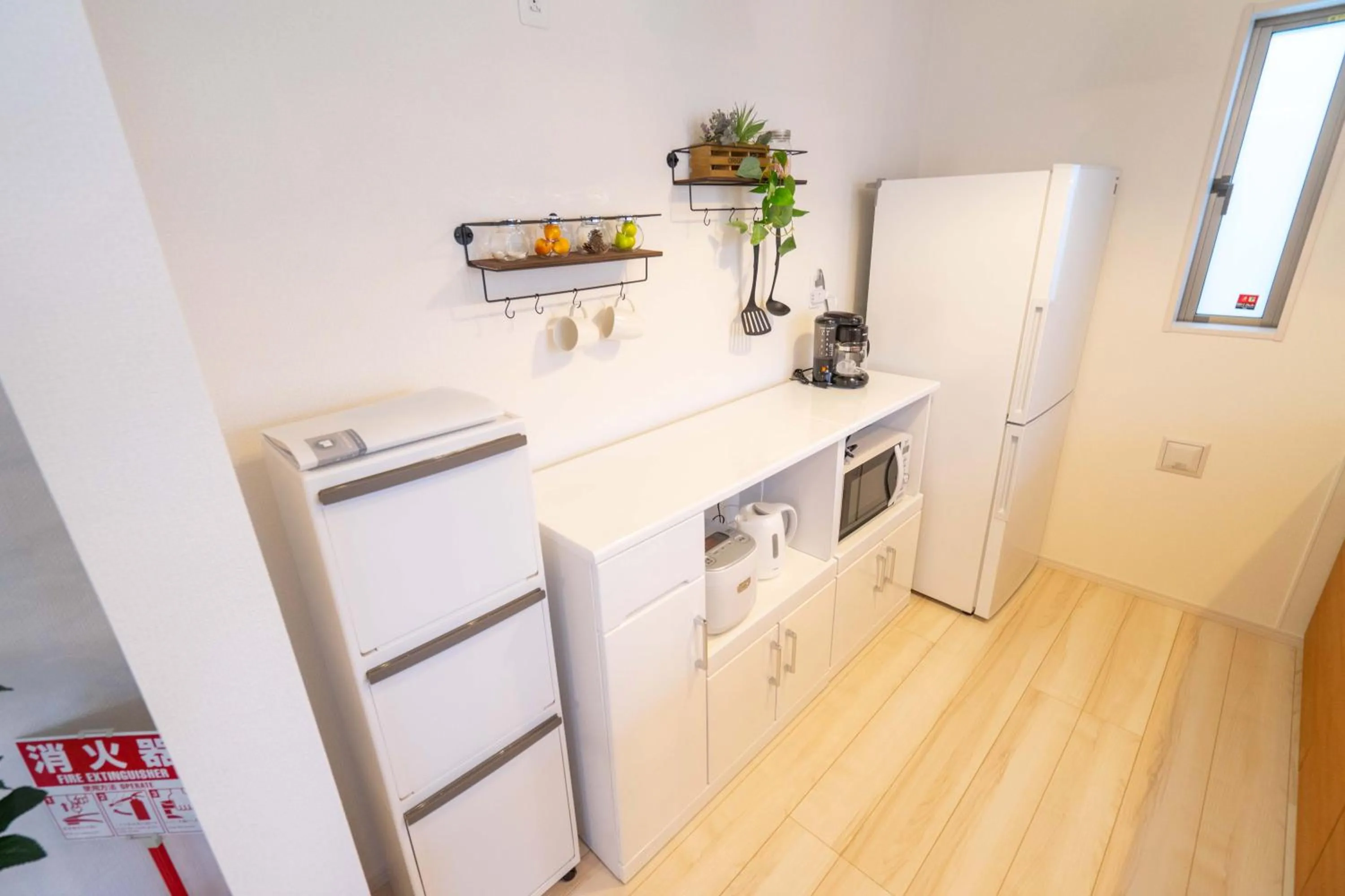 Kitchen or kitchenette in OKINAWA BEACH HOUSE Golden Drop S