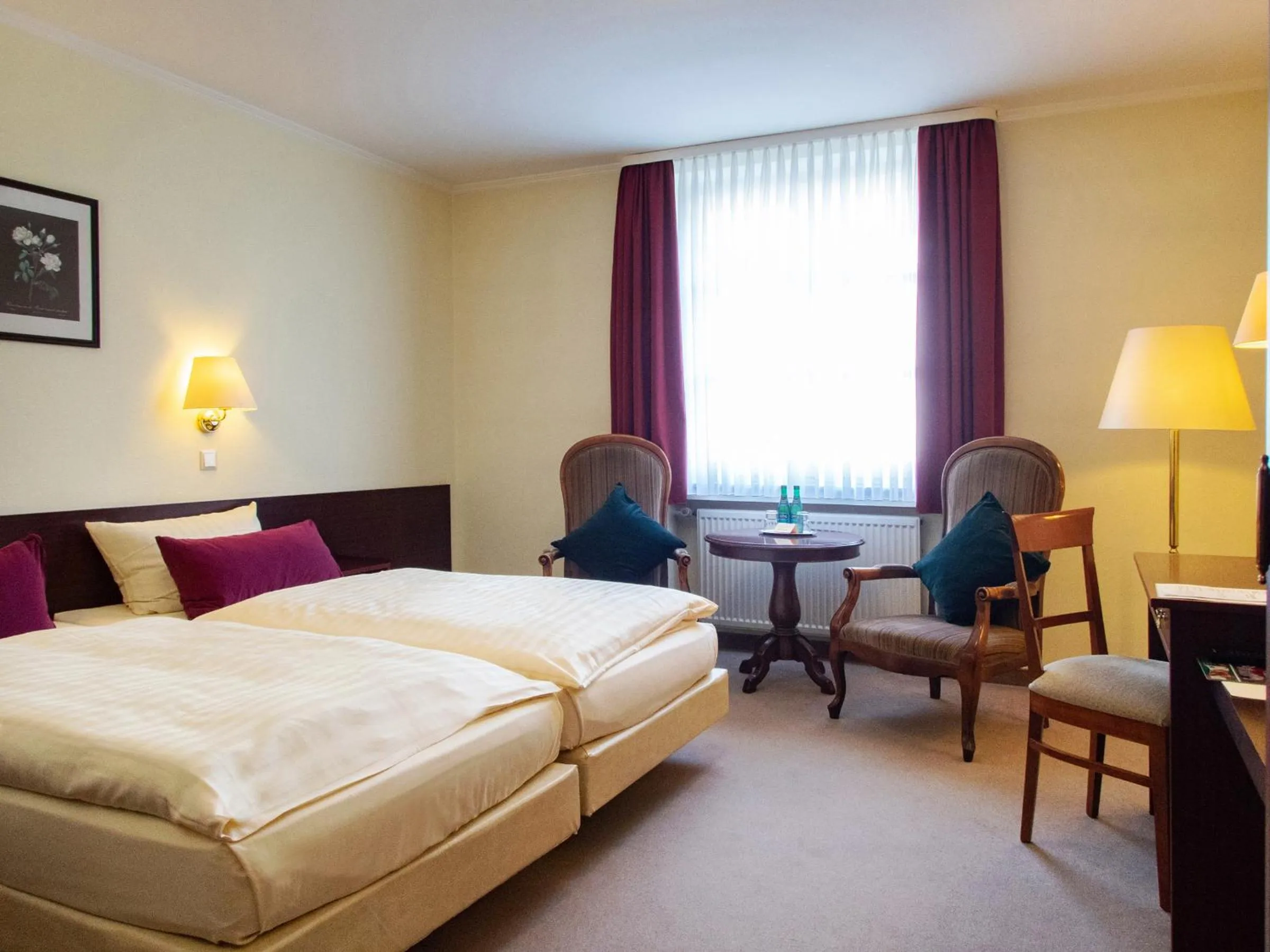 Photo of the whole room, Bed in Hotel Bürgerhof Wetzlar