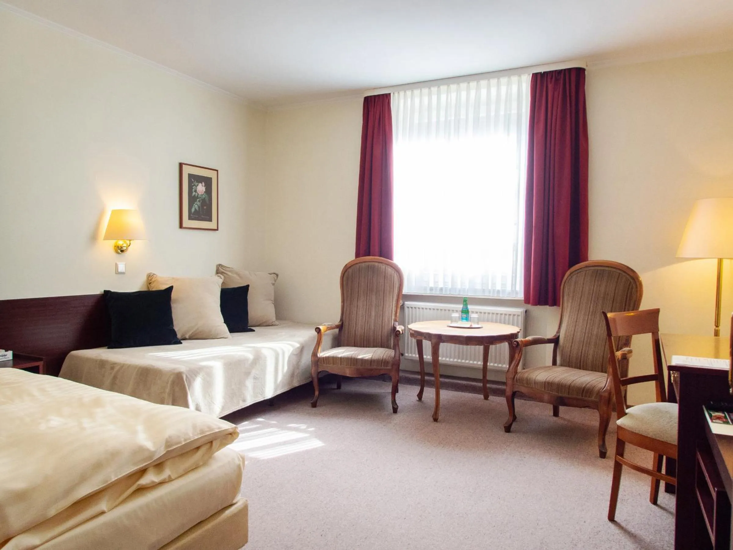 Photo of the whole room, Bed in Hotel Bürgerhof Wetzlar