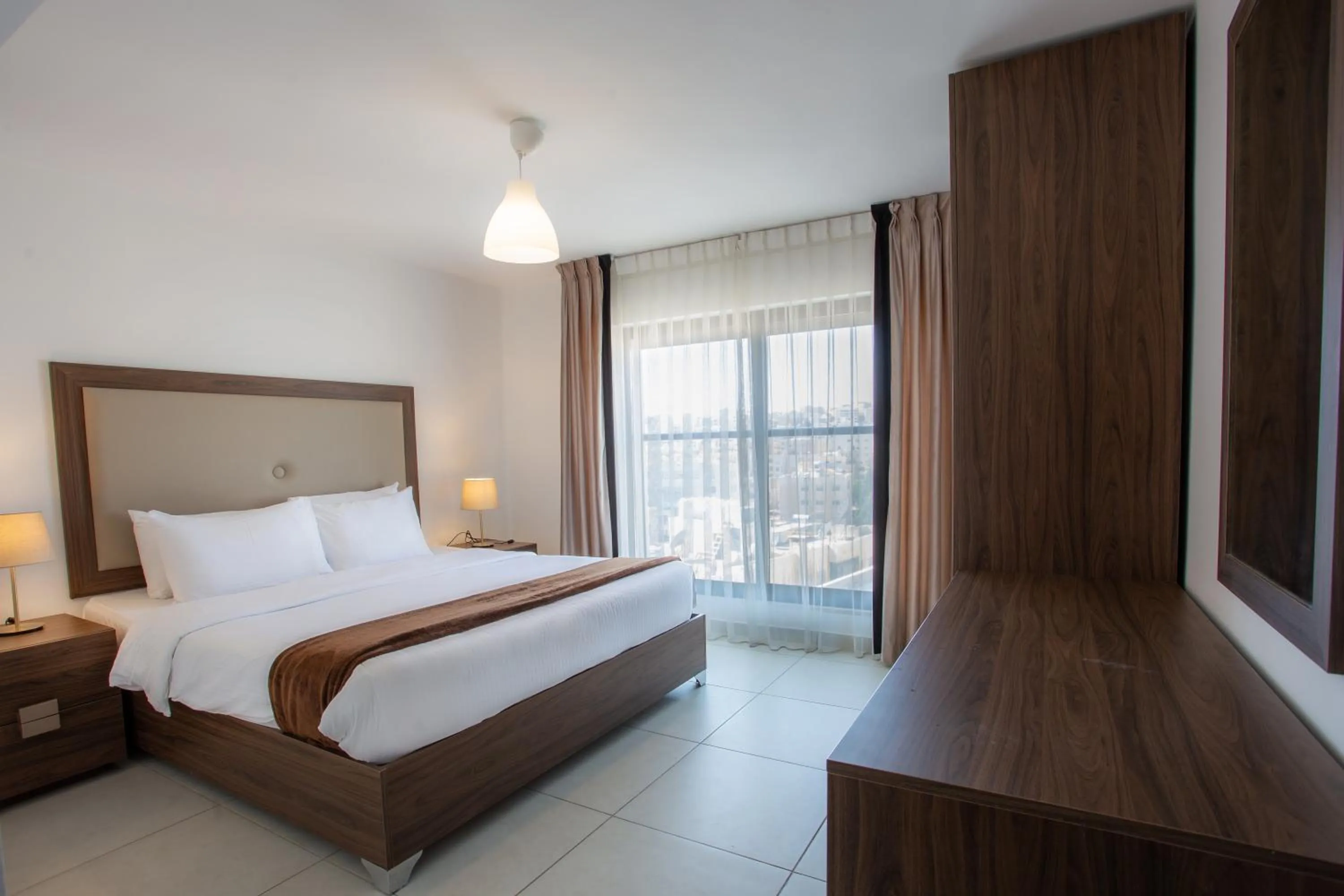 Bedroom, Bed in Triple A Hotel Suites