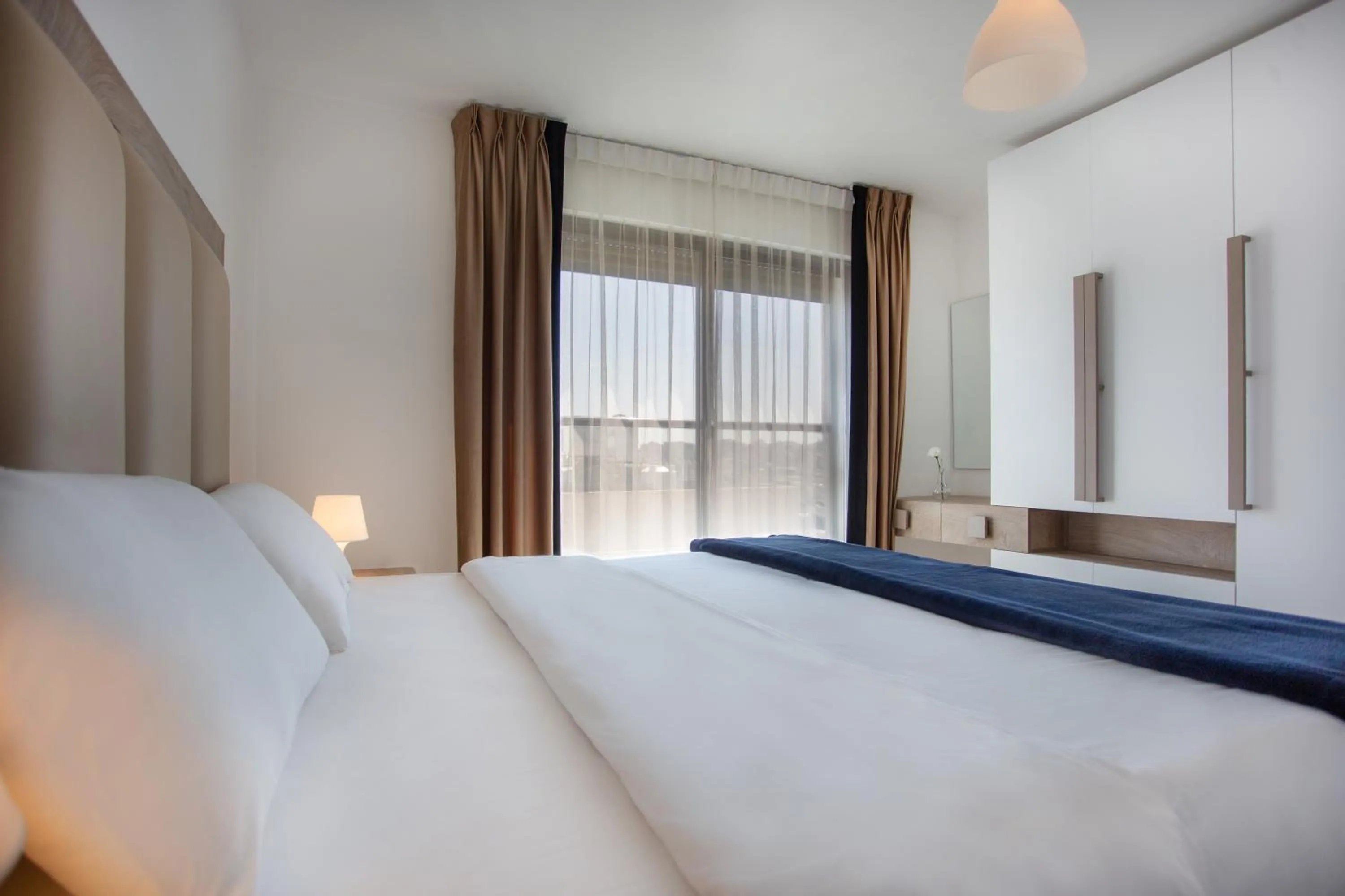 Bedroom, Bed in Triple A Hotel Suites