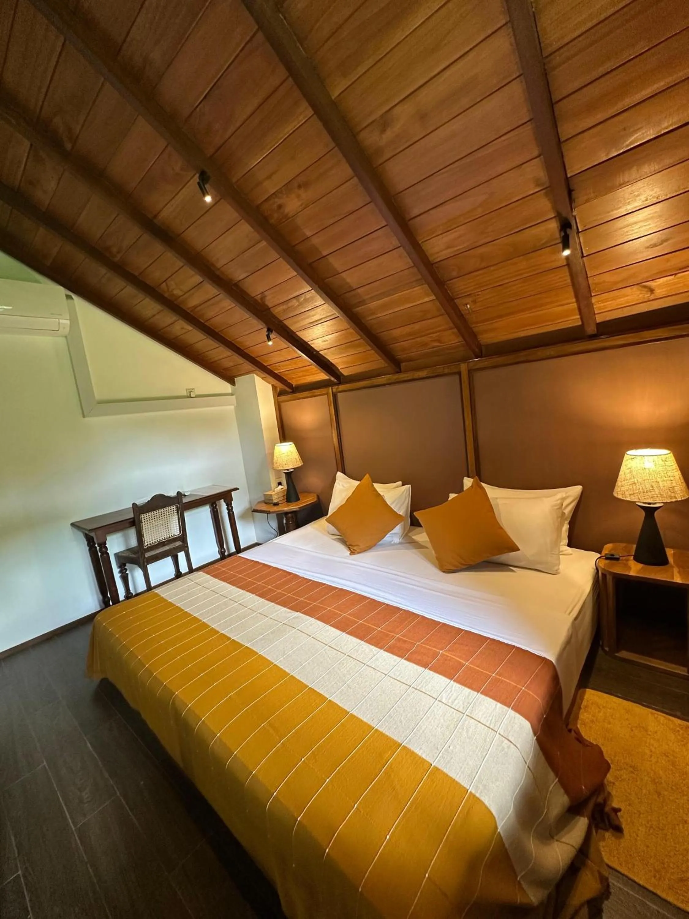 Bed in Dunes Unawatuna Hotel