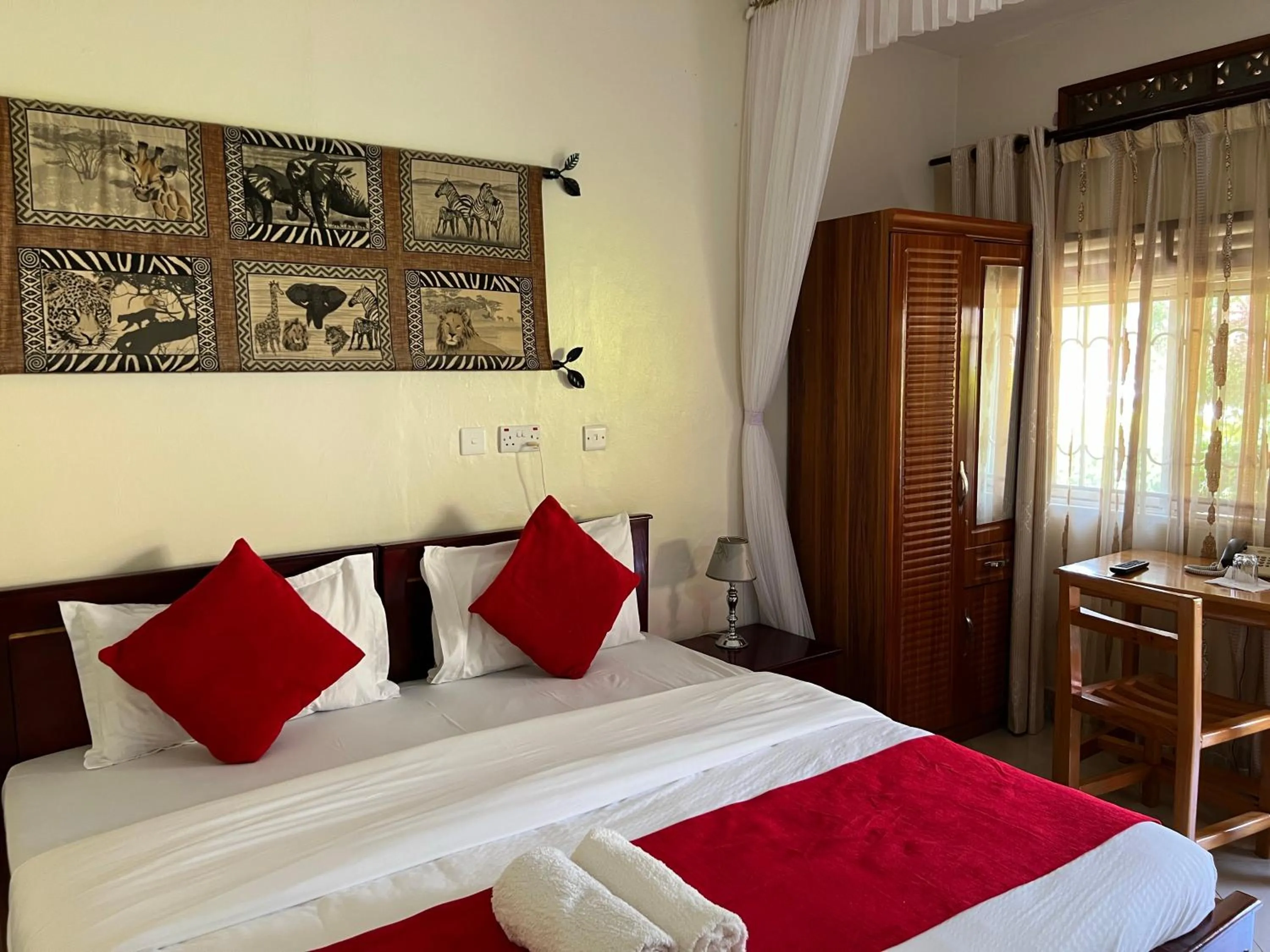 Bed in Sunset Hotel Entebbe