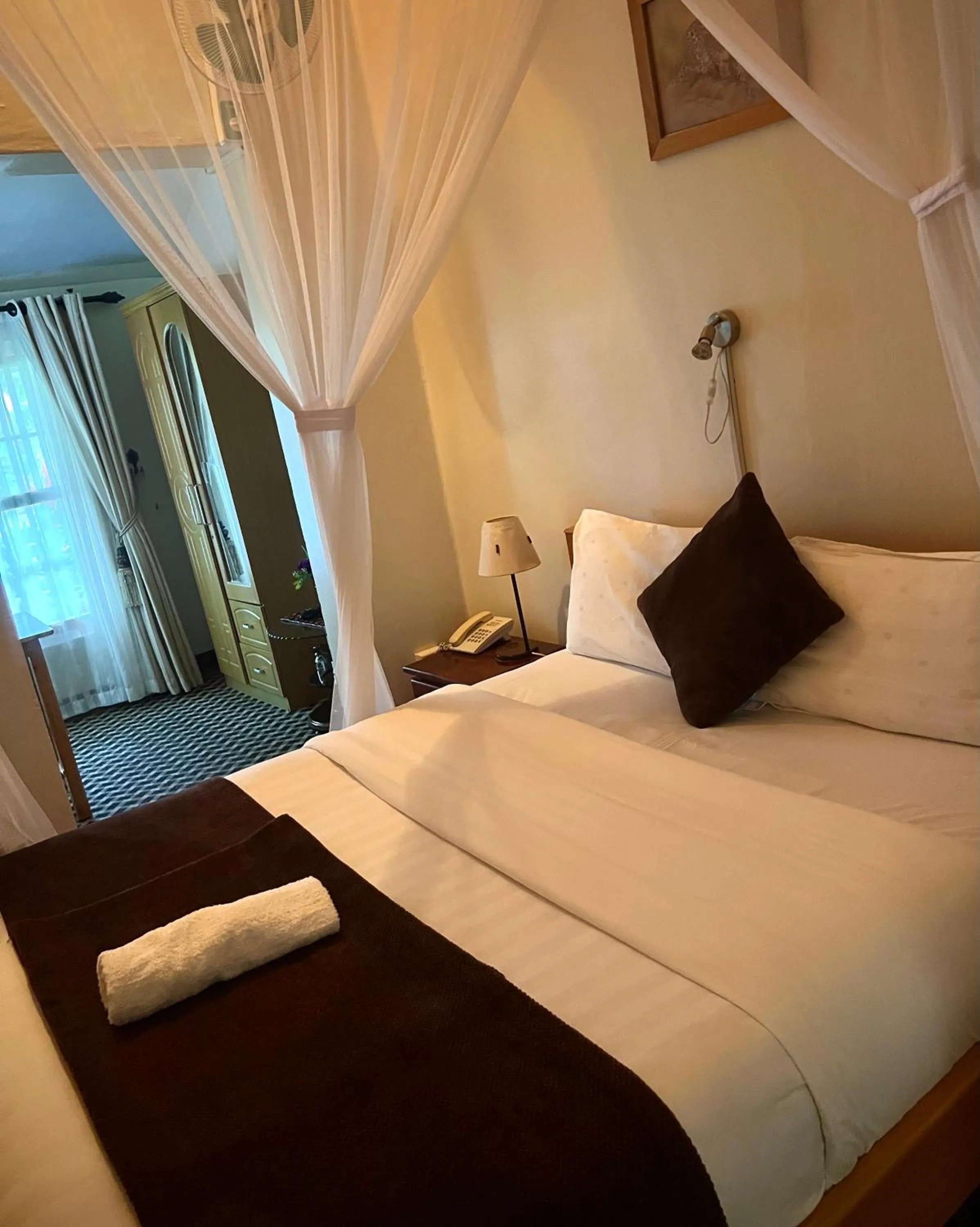 Bed in Sunset Hotel Entebbe