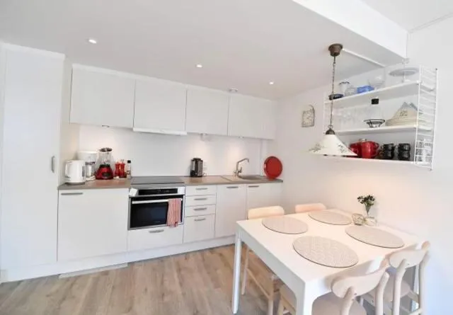 Kitchen or kitchenette in Lägenhetshotell Varvet