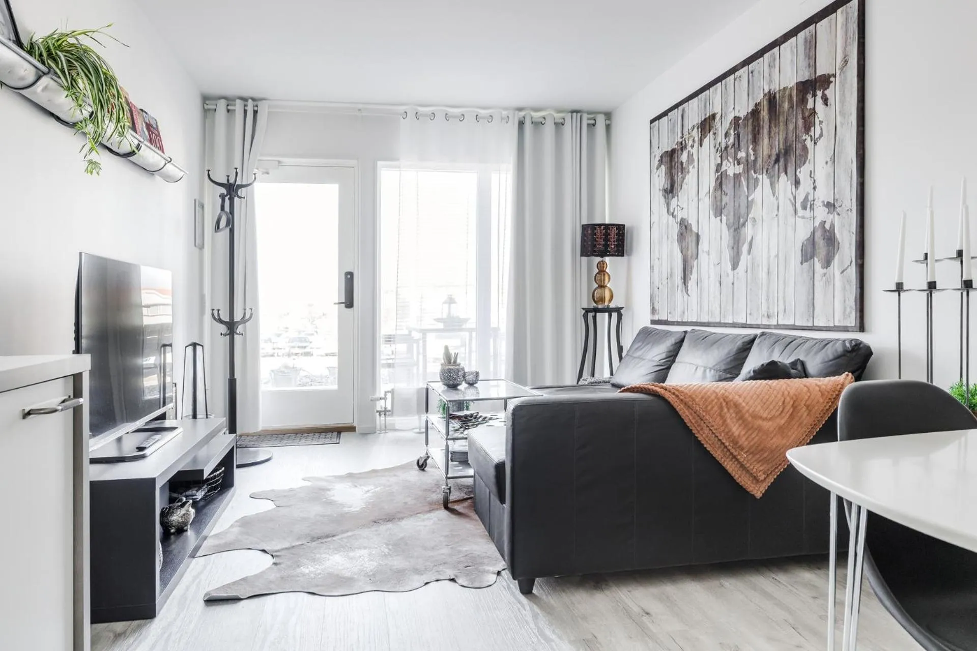 Living room, Bed in Lägenhetshotell Varvet