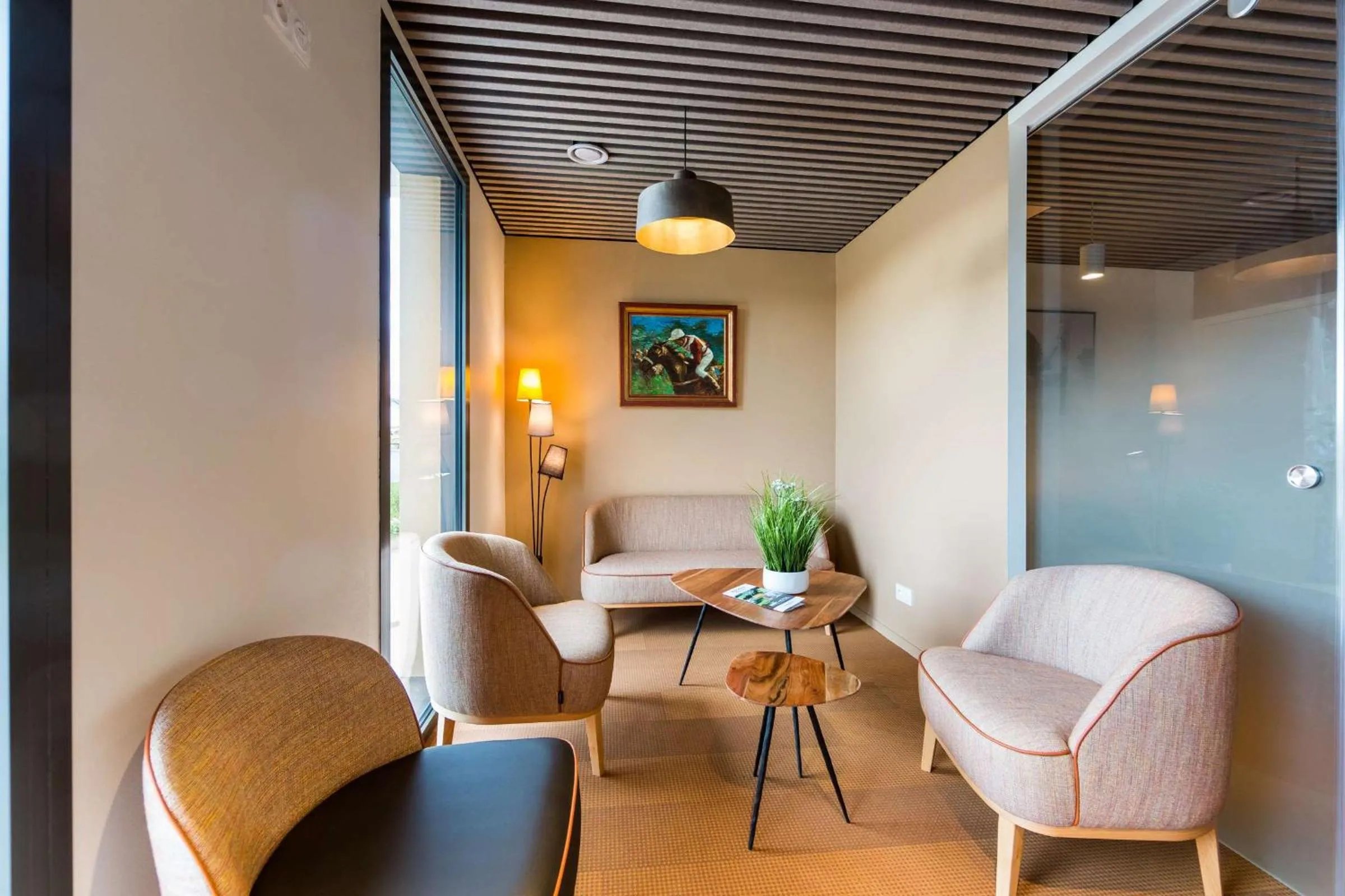 Lobby or reception in Brit Hotel Ploermel - Hotel de l'Hippodrome