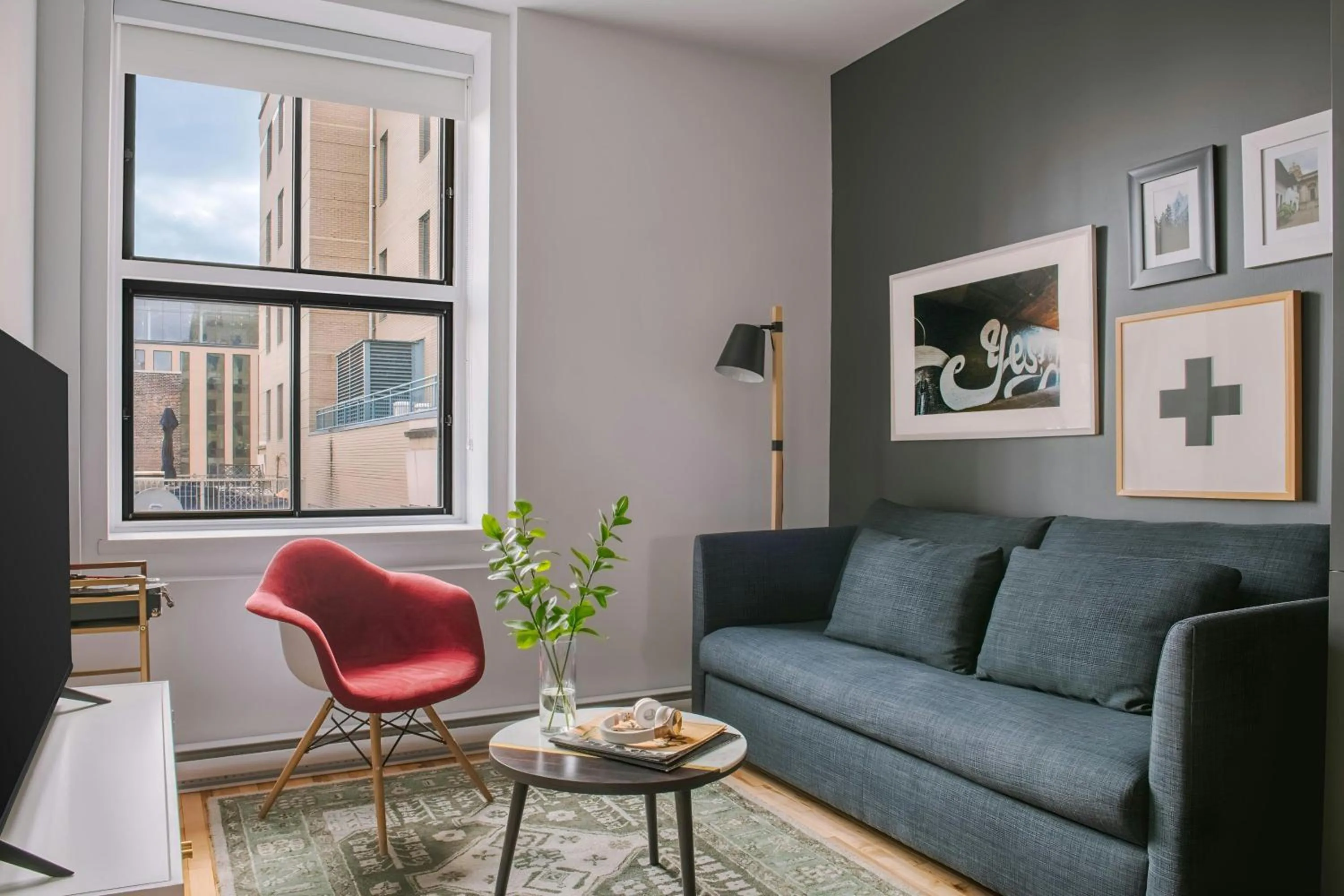Living room in Sonder by Marriott Bonvoy Le Victoria Apartments Old Montreal