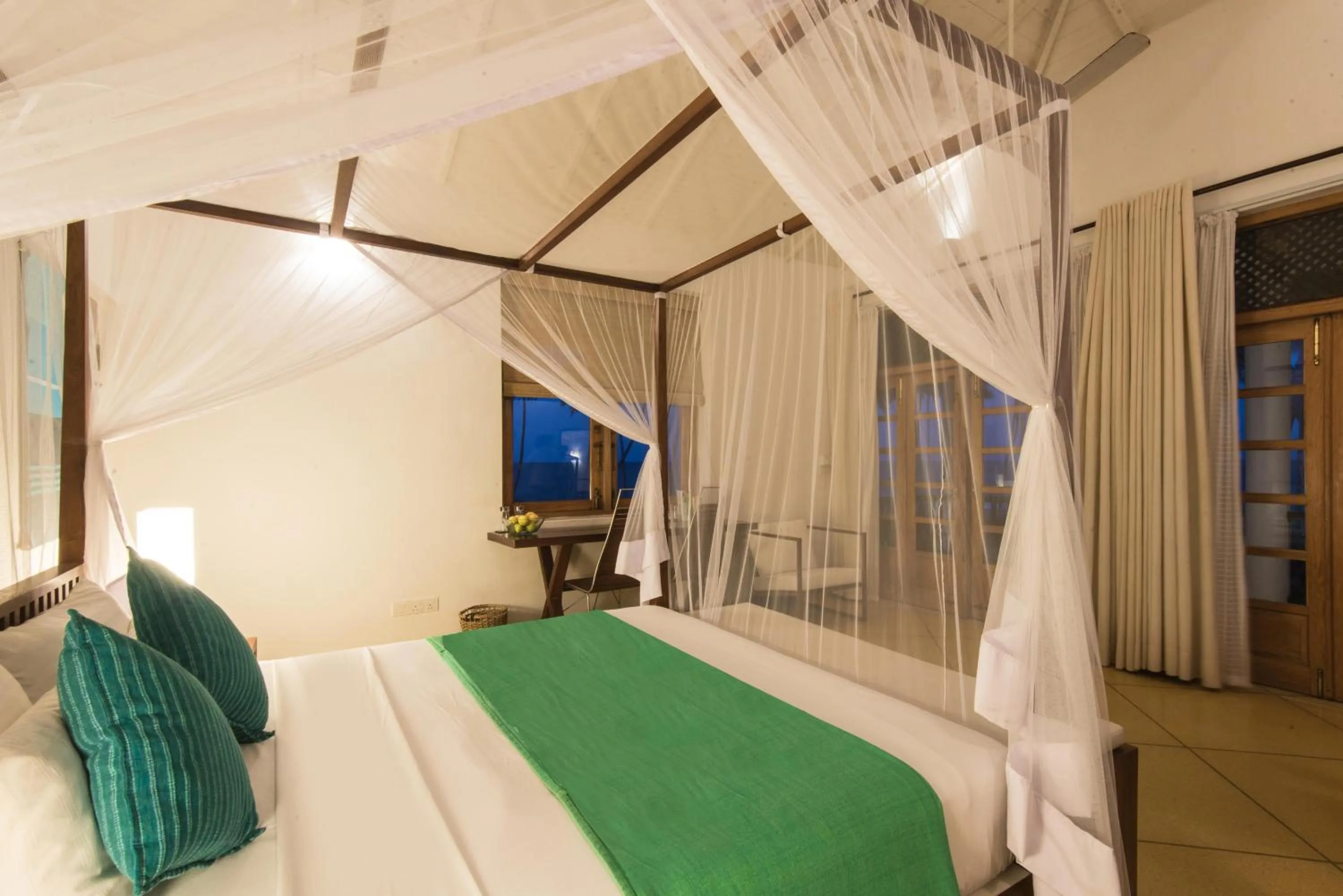 Bed in Jetwing Kottukal Beach House