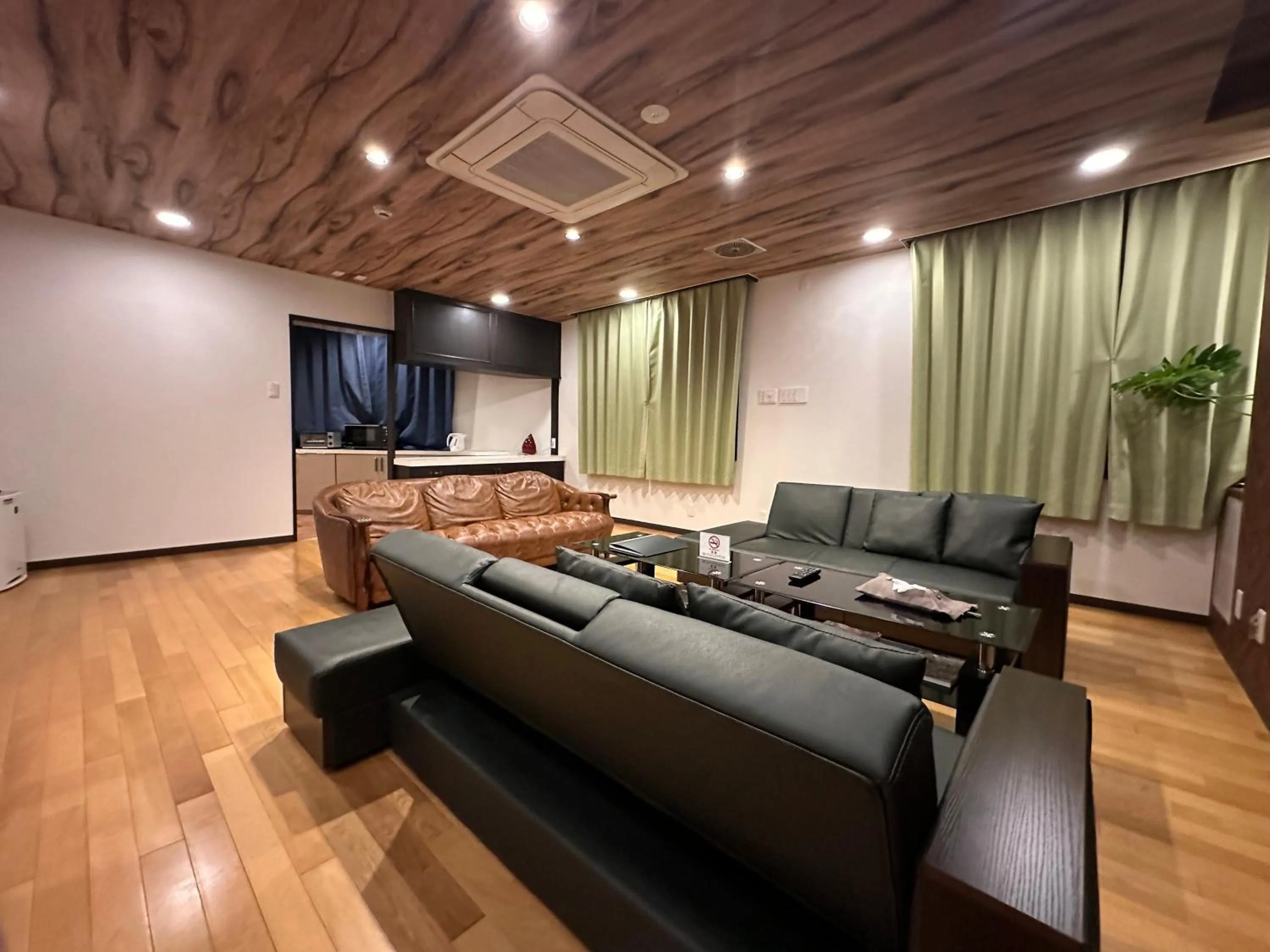 Living room in Economy Hotel Upashi