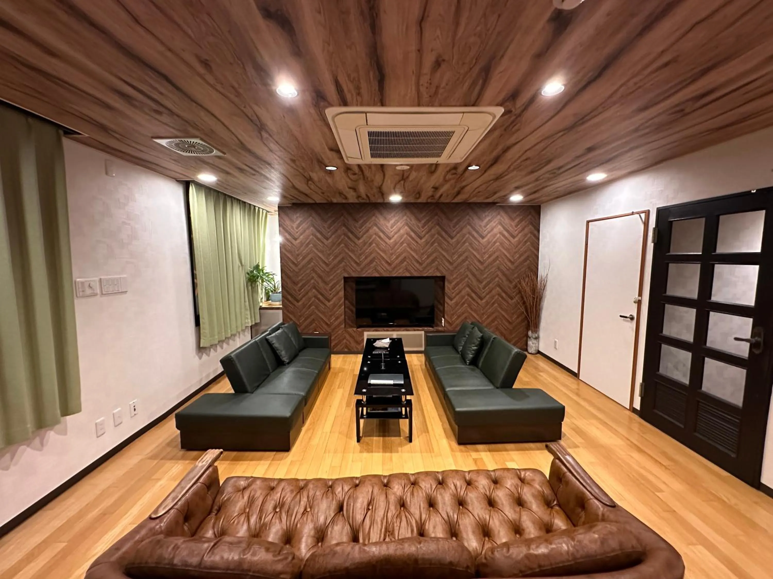 Living room in Economy Hotel Upashi