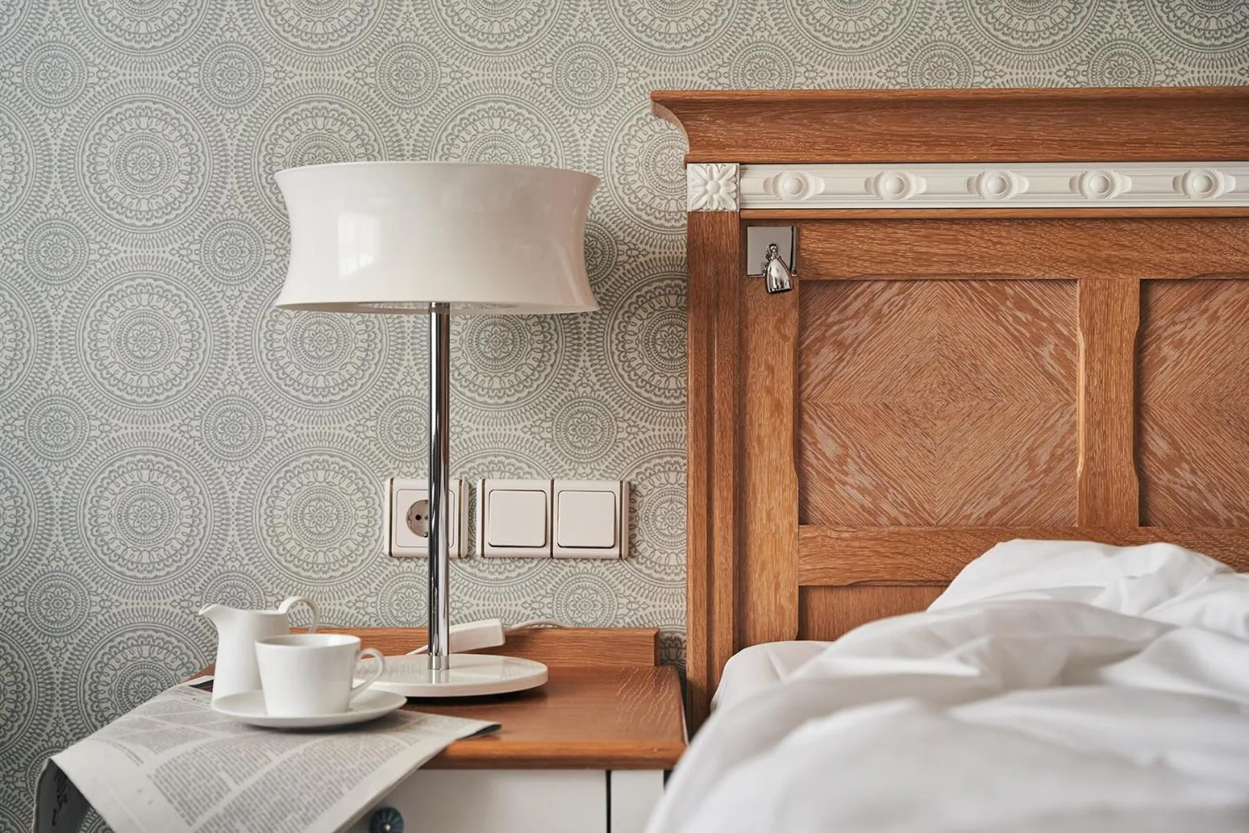 Photo of the whole room, Bed in A-ROSA Kurhaus Binz