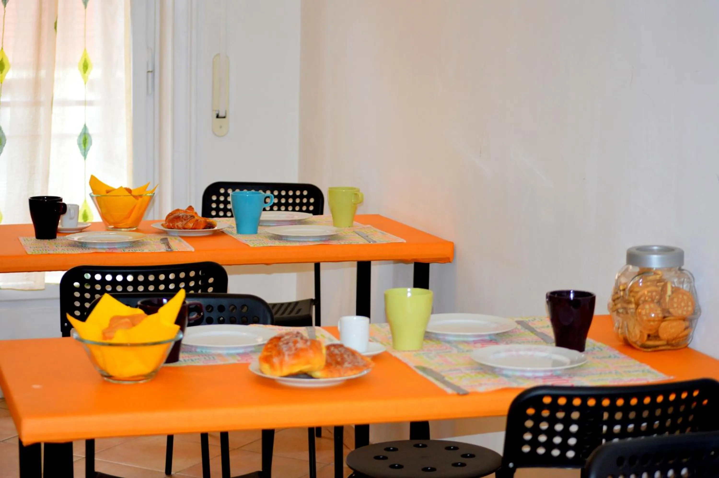 Communal kitchen in Check-Inn Rooms