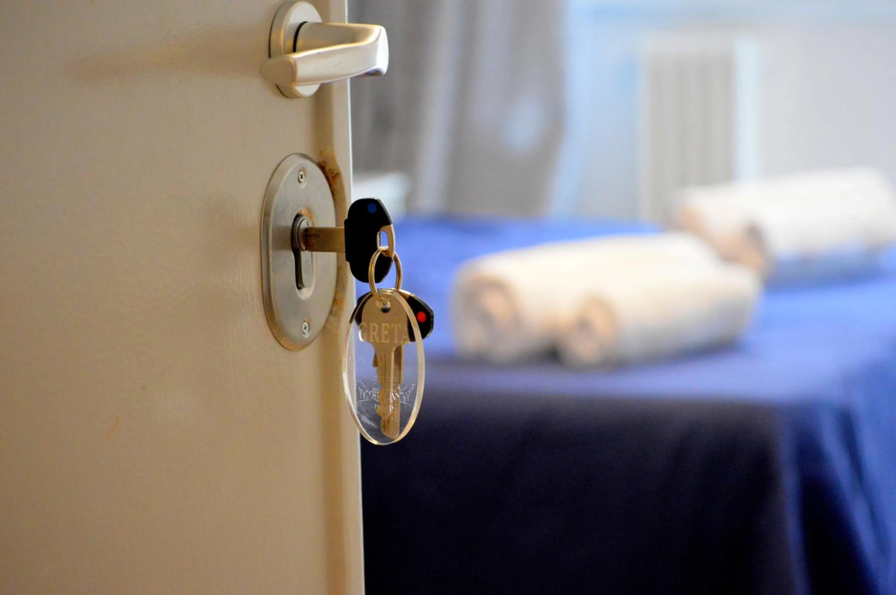 Photo of the whole room, Bed in Check-Inn Rooms