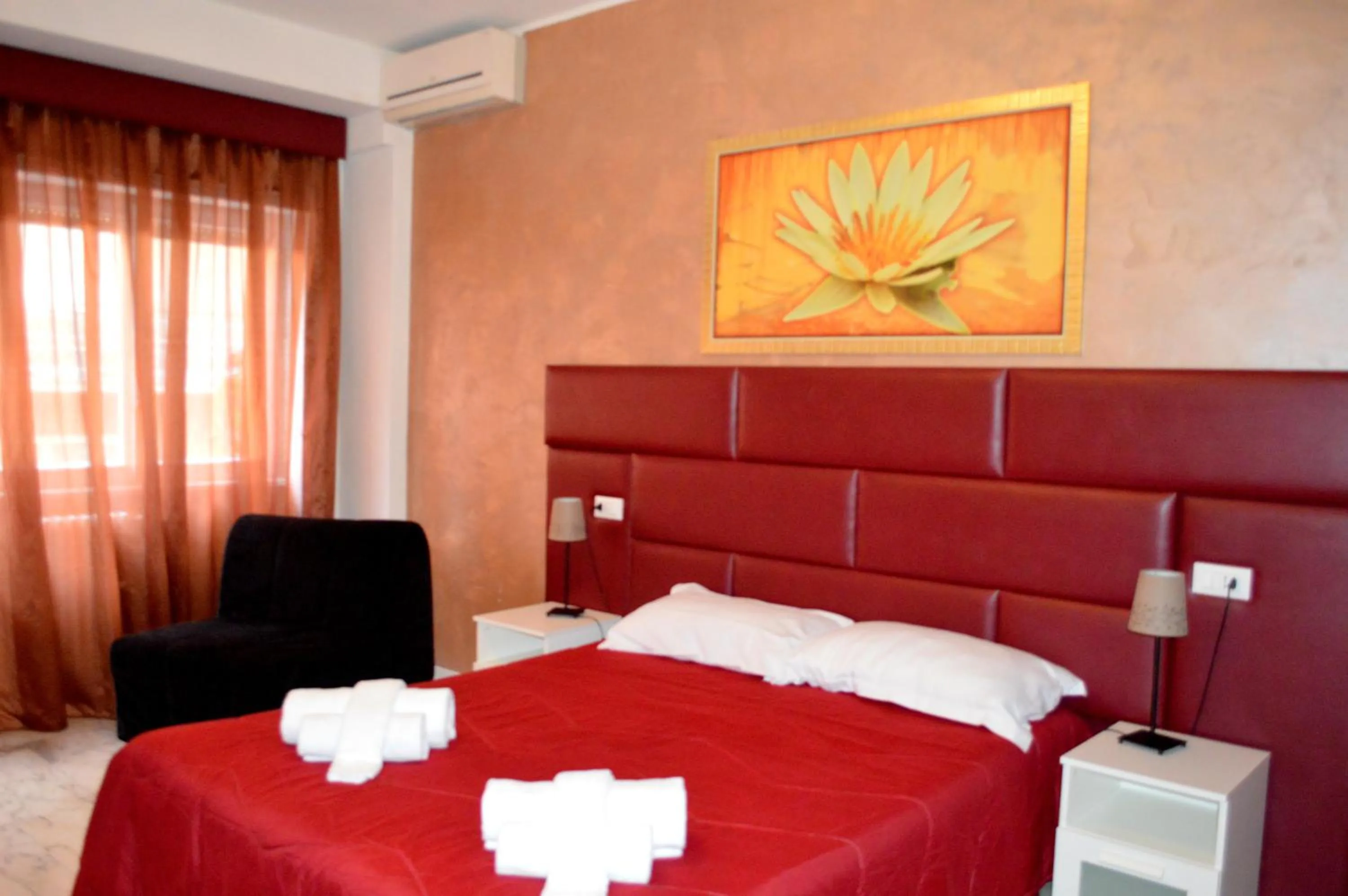 Bed in Check-Inn Rooms