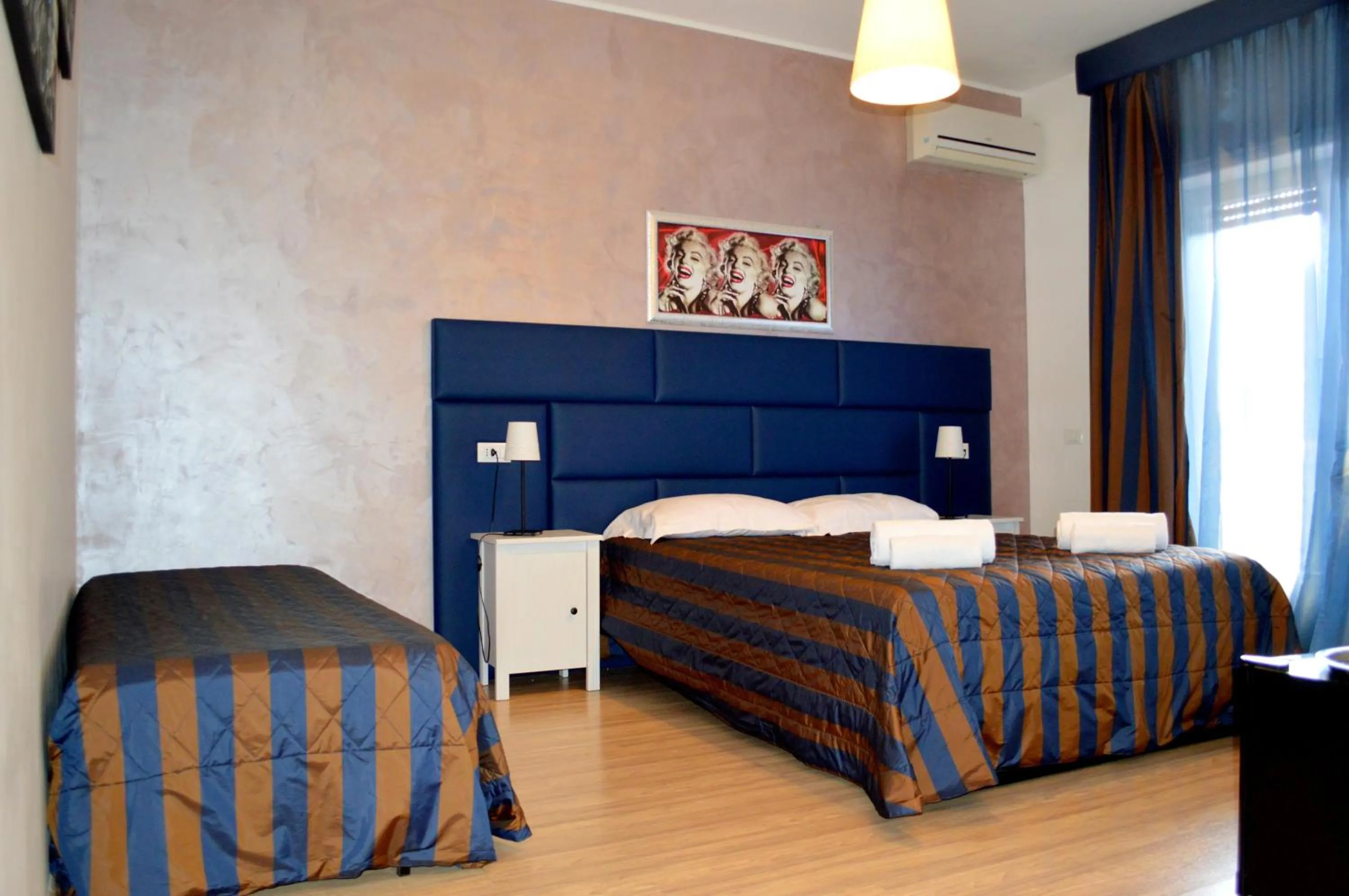 Photo of the whole room, Bed in Check-Inn Rooms