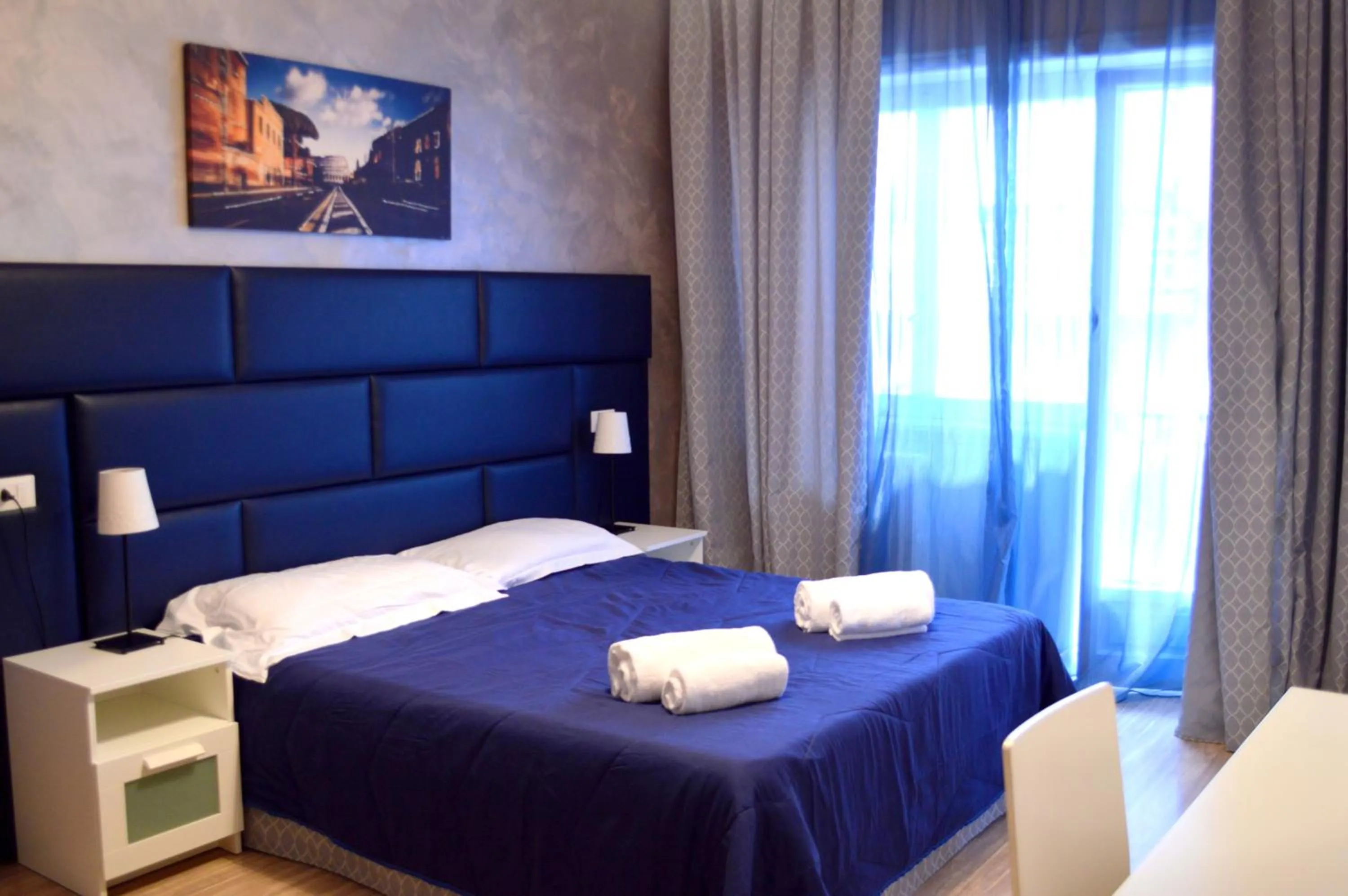 Bed in Check-Inn Rooms