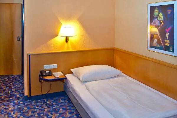 Bed in Hotel Strohofer