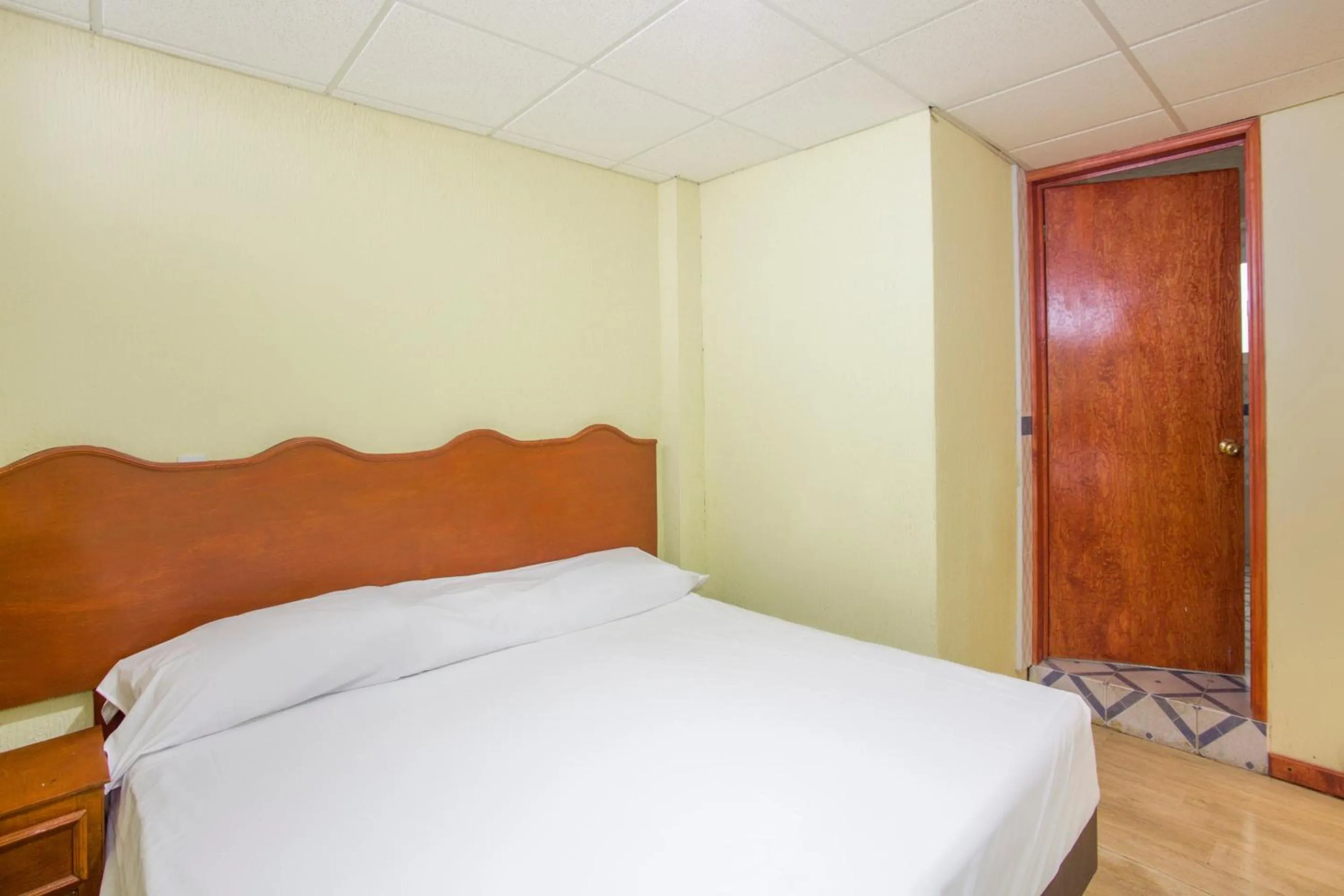 Bedroom, Bed in OYO Hotel San Agustin