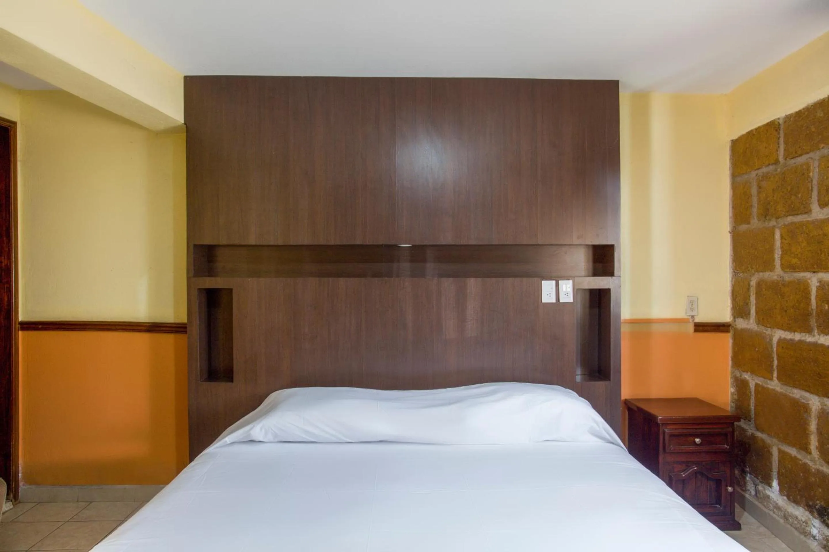 Bedroom, Bed in OYO Hotel San Agustin