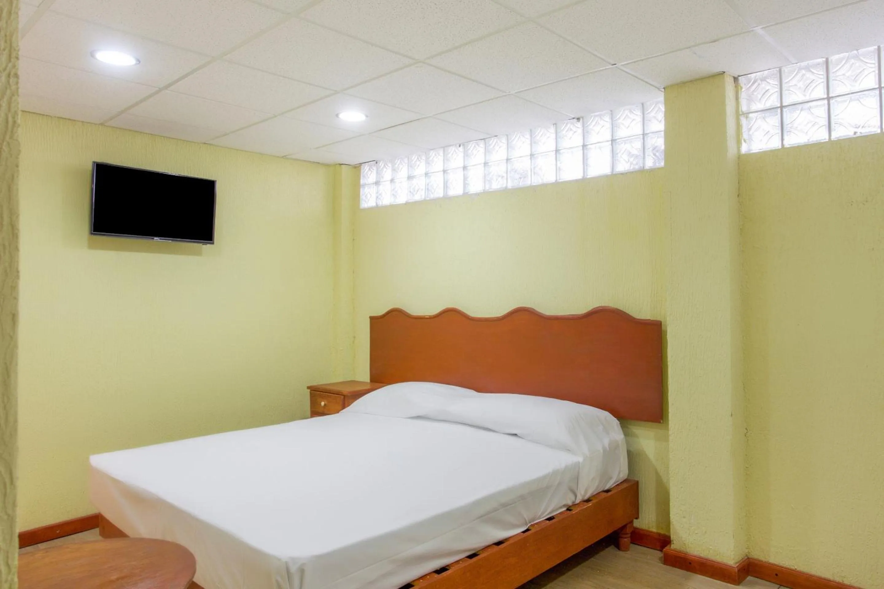 Bedroom, Bed in OYO Hotel San Agustin