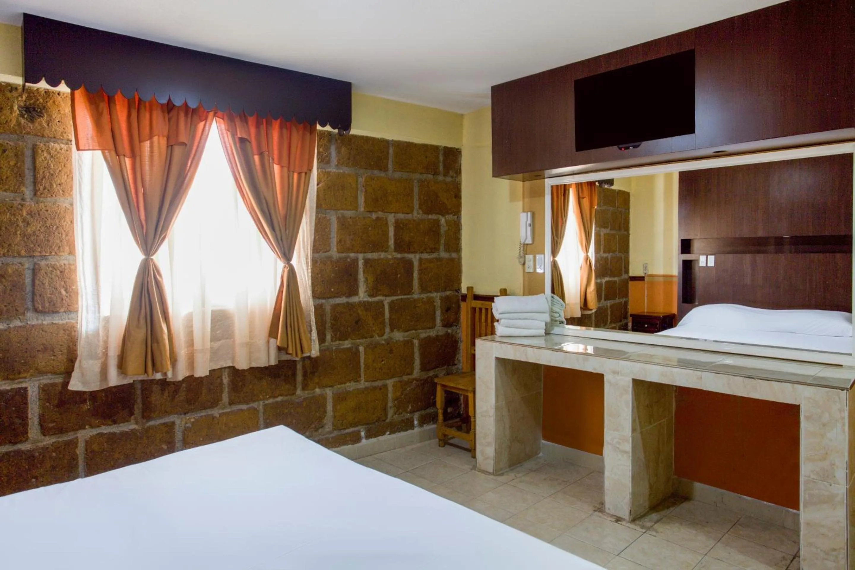 Bedroom, Bed in OYO Hotel San Agustin