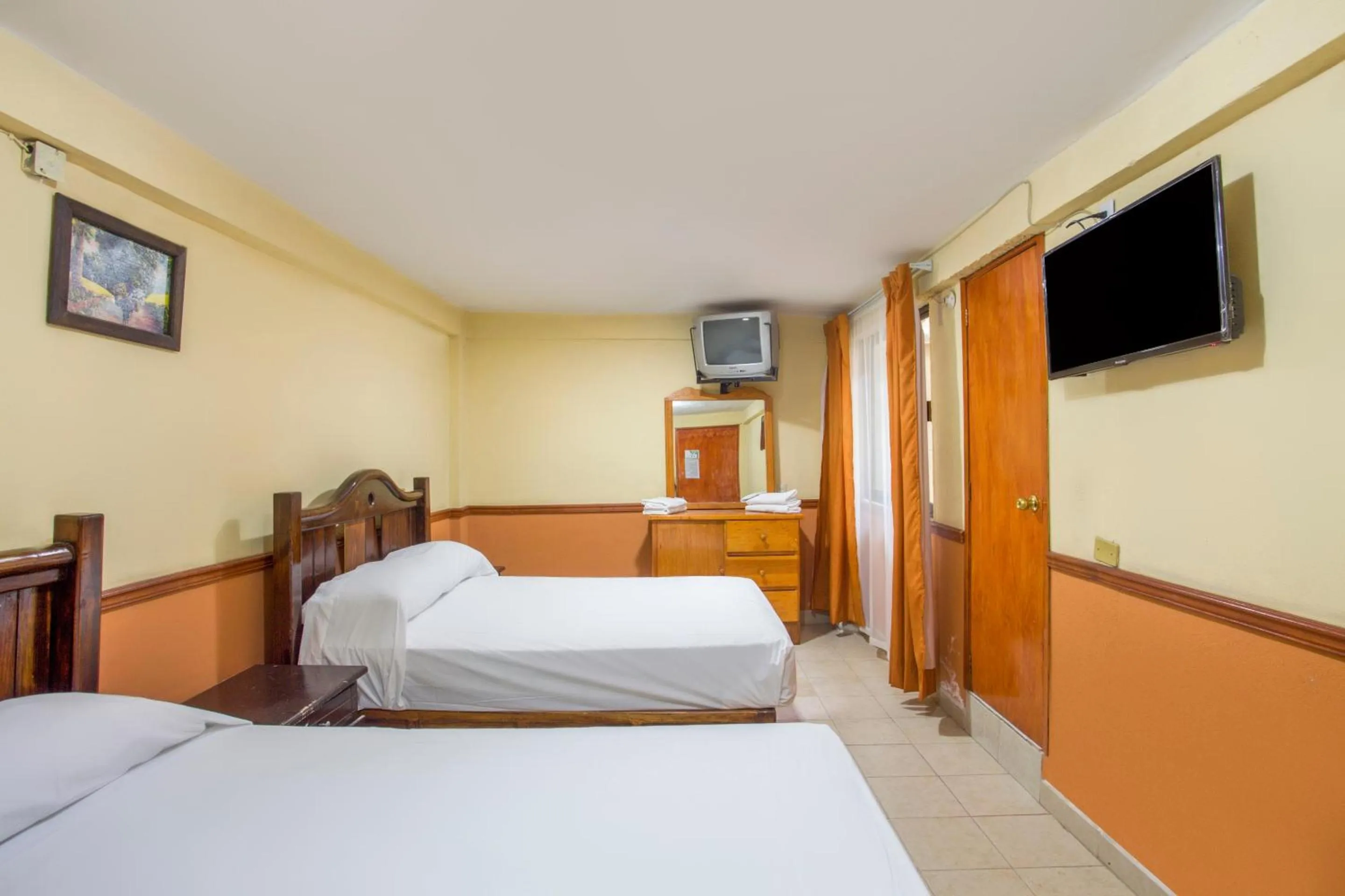 Bedroom, Bed in OYO Hotel San Agustin