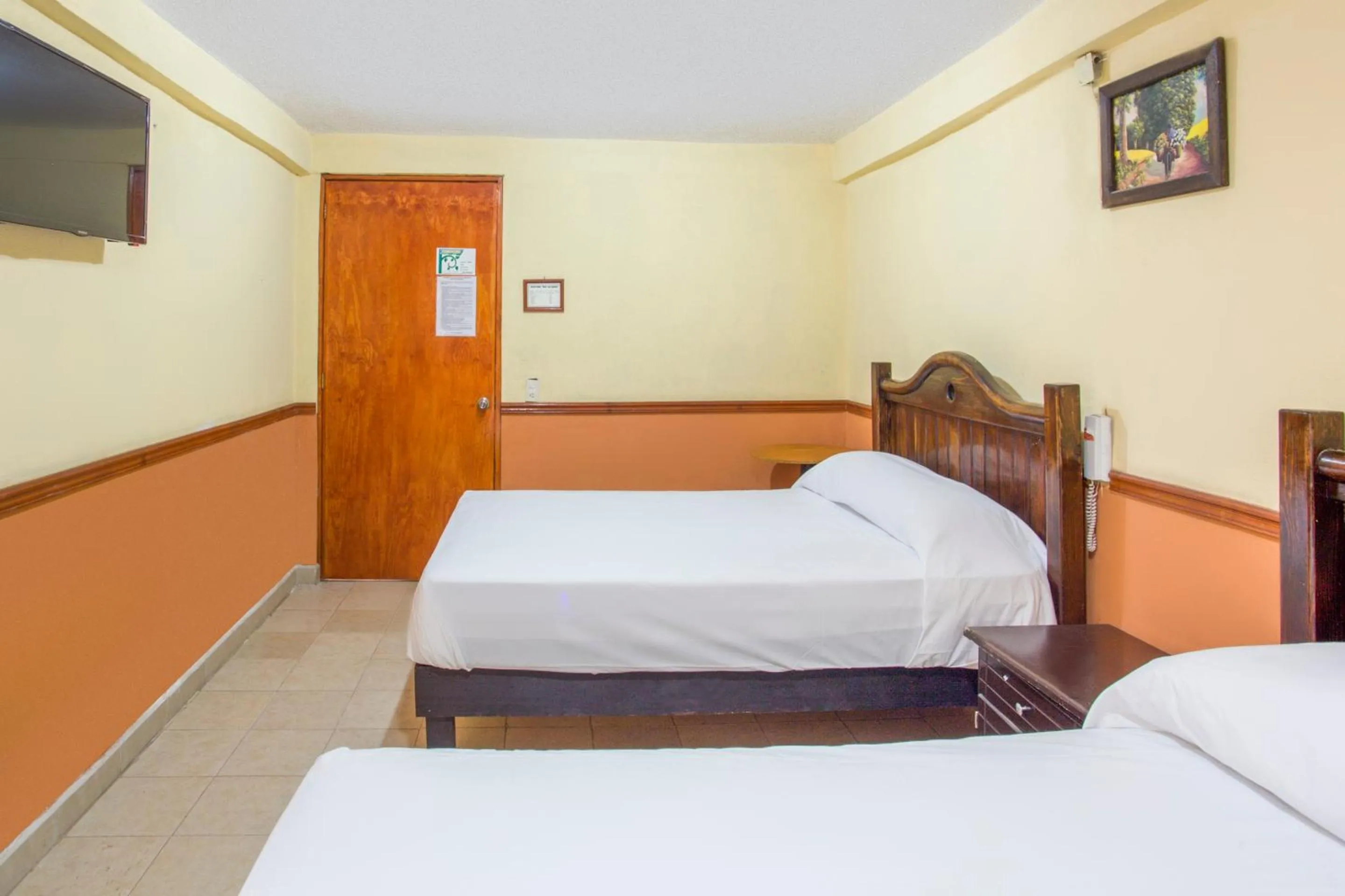 Bedroom, Bed in OYO Hotel San Agustin