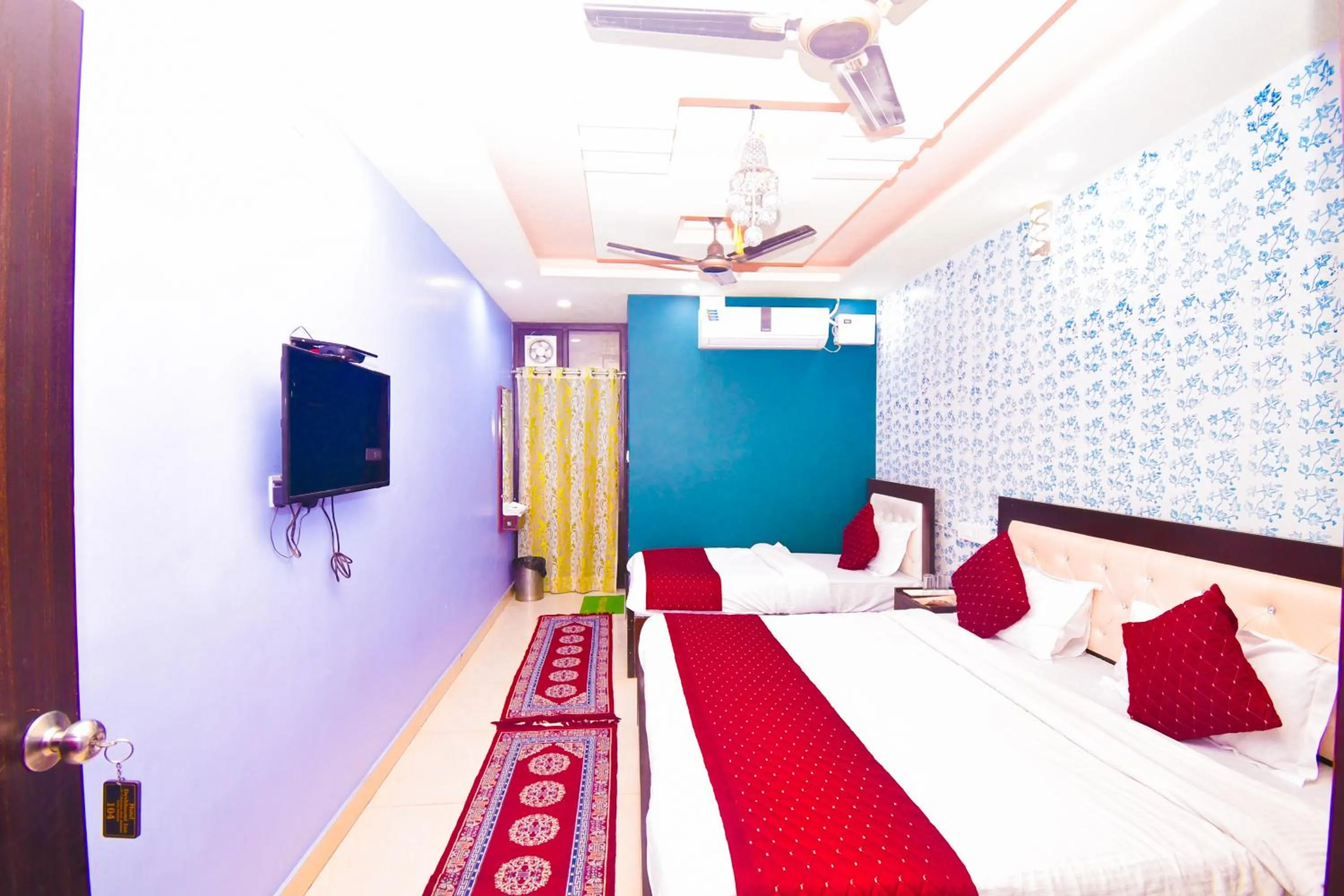 Bed in Hotel Dev Bhoomi Inn