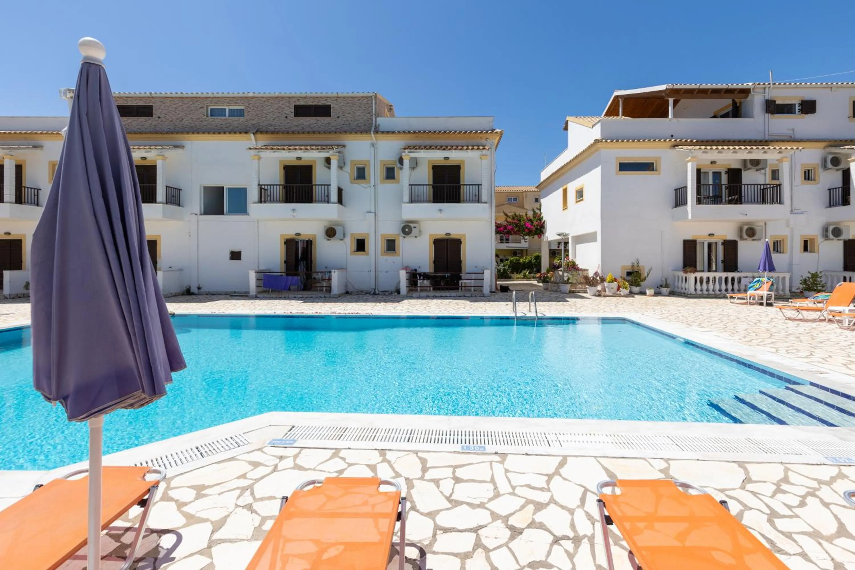 Property building in Dora Pool Studios by Konnect,150m from the Beach