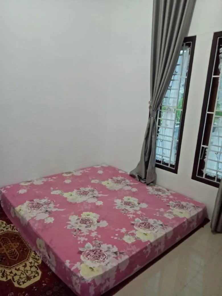 Bed in Villa SINGGALANG Syariah
