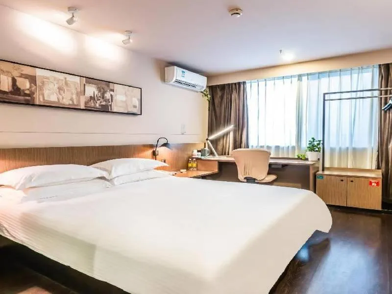 Bed in Jinjiang Inn Select Hangzhou Binjiang University Town Puyan Metro Station