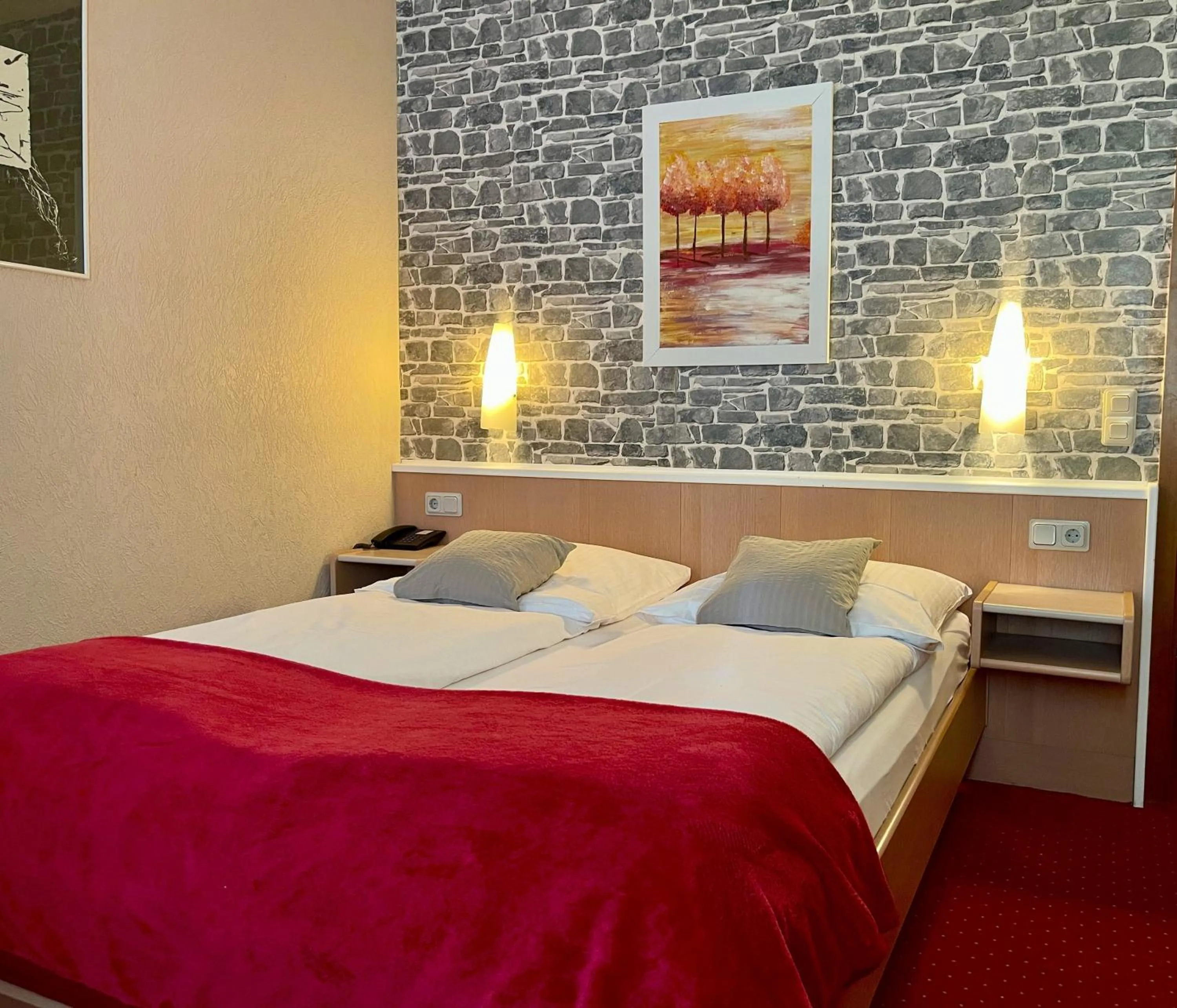 Bed in Hotel Stadt Hamburg am Fluss Saarbrücken