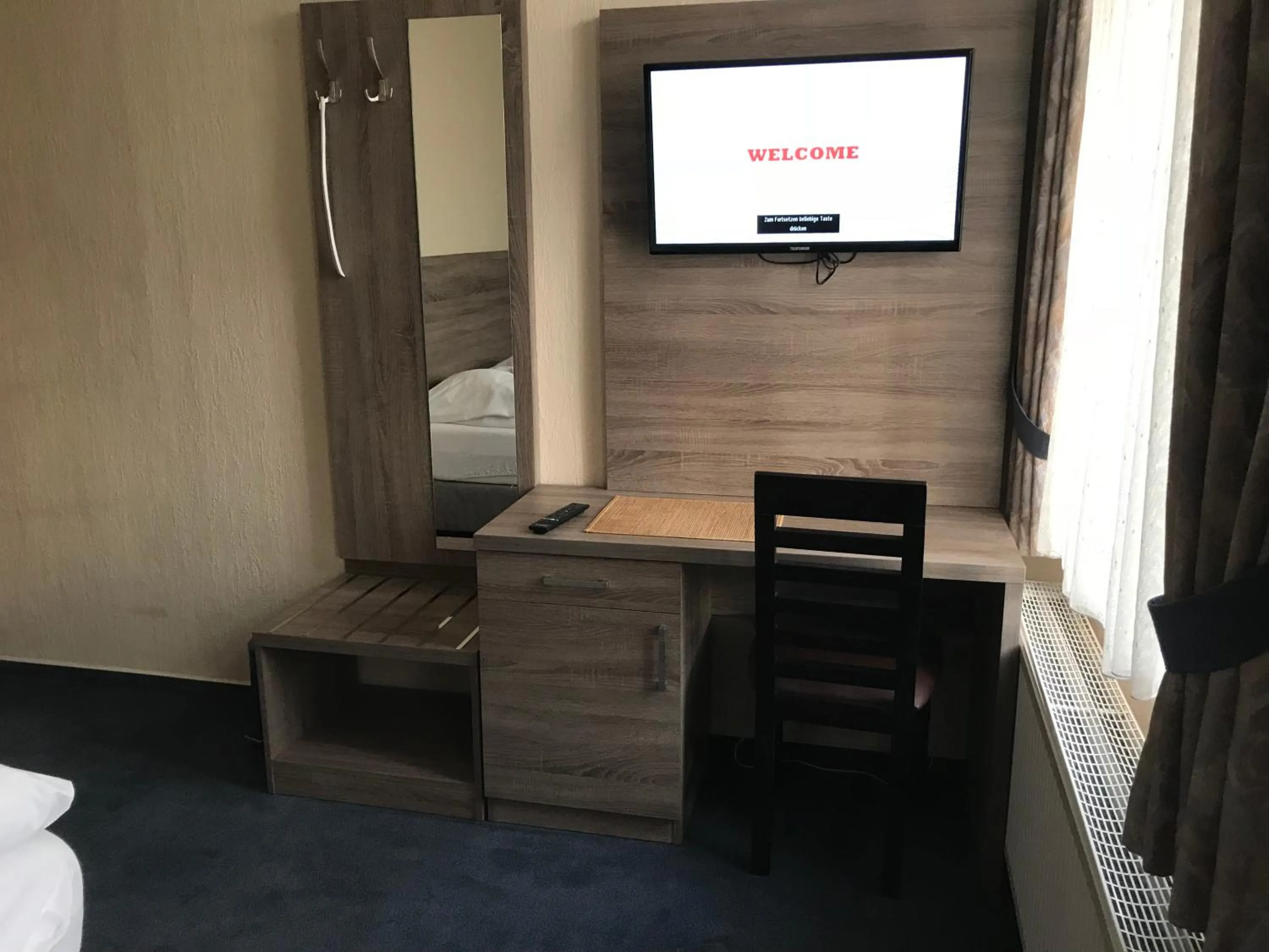 Communal lounge/ TV room in Hotel Junkerhaus