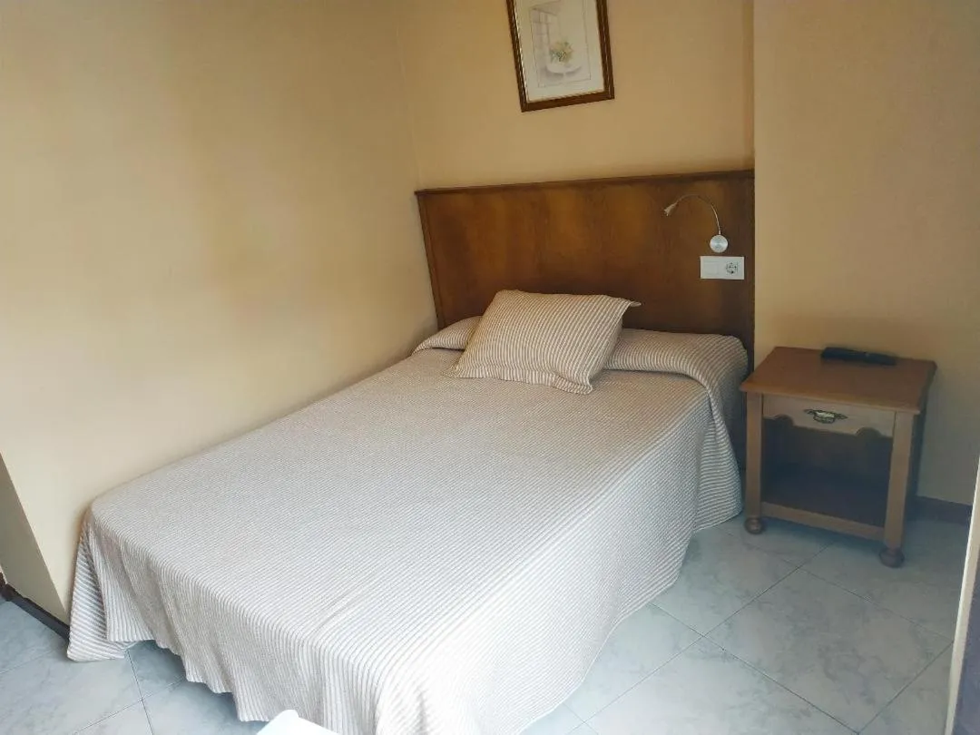 Bed in Hotel Cristaleiro