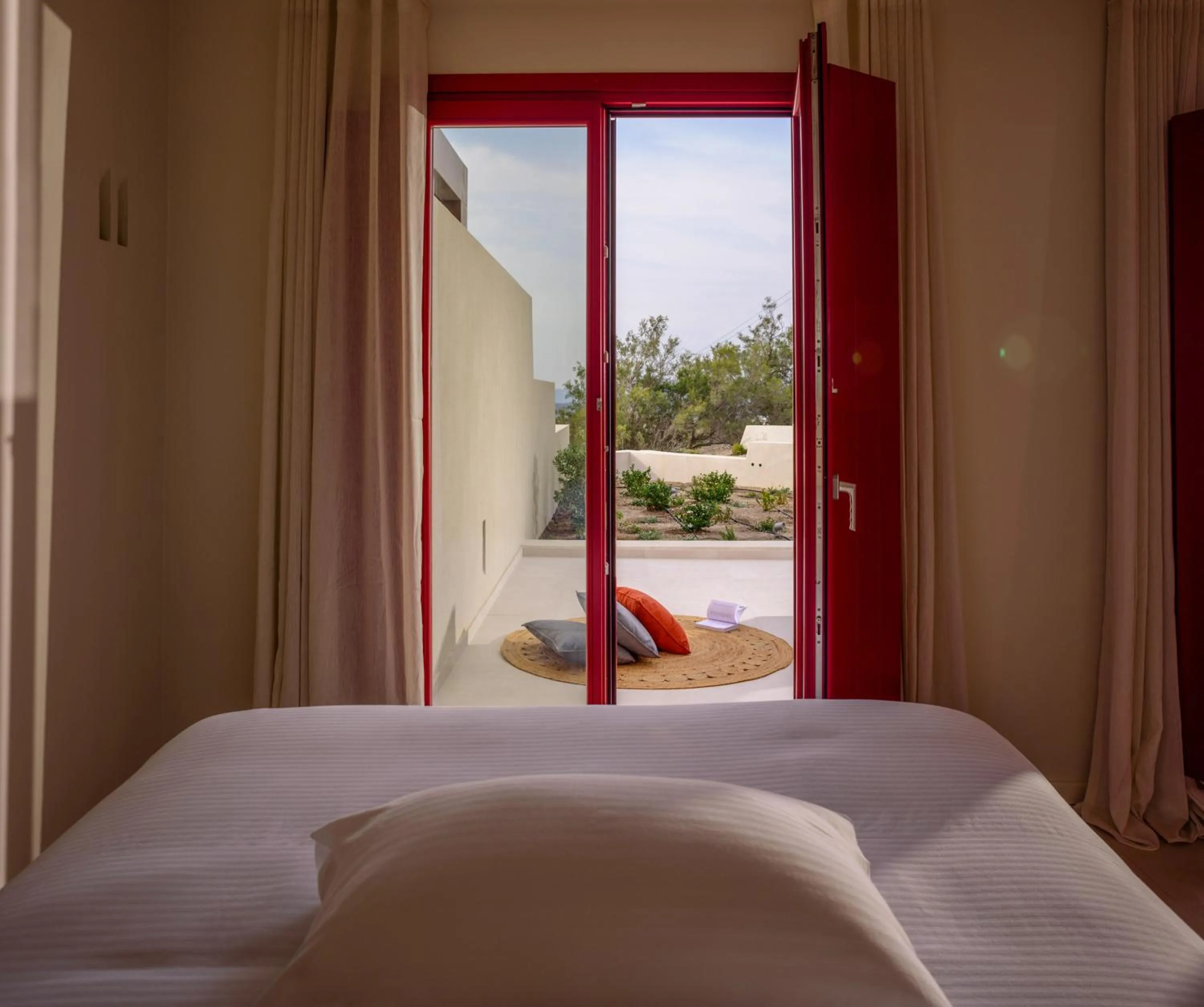 Bed in Potnia Theron Suites