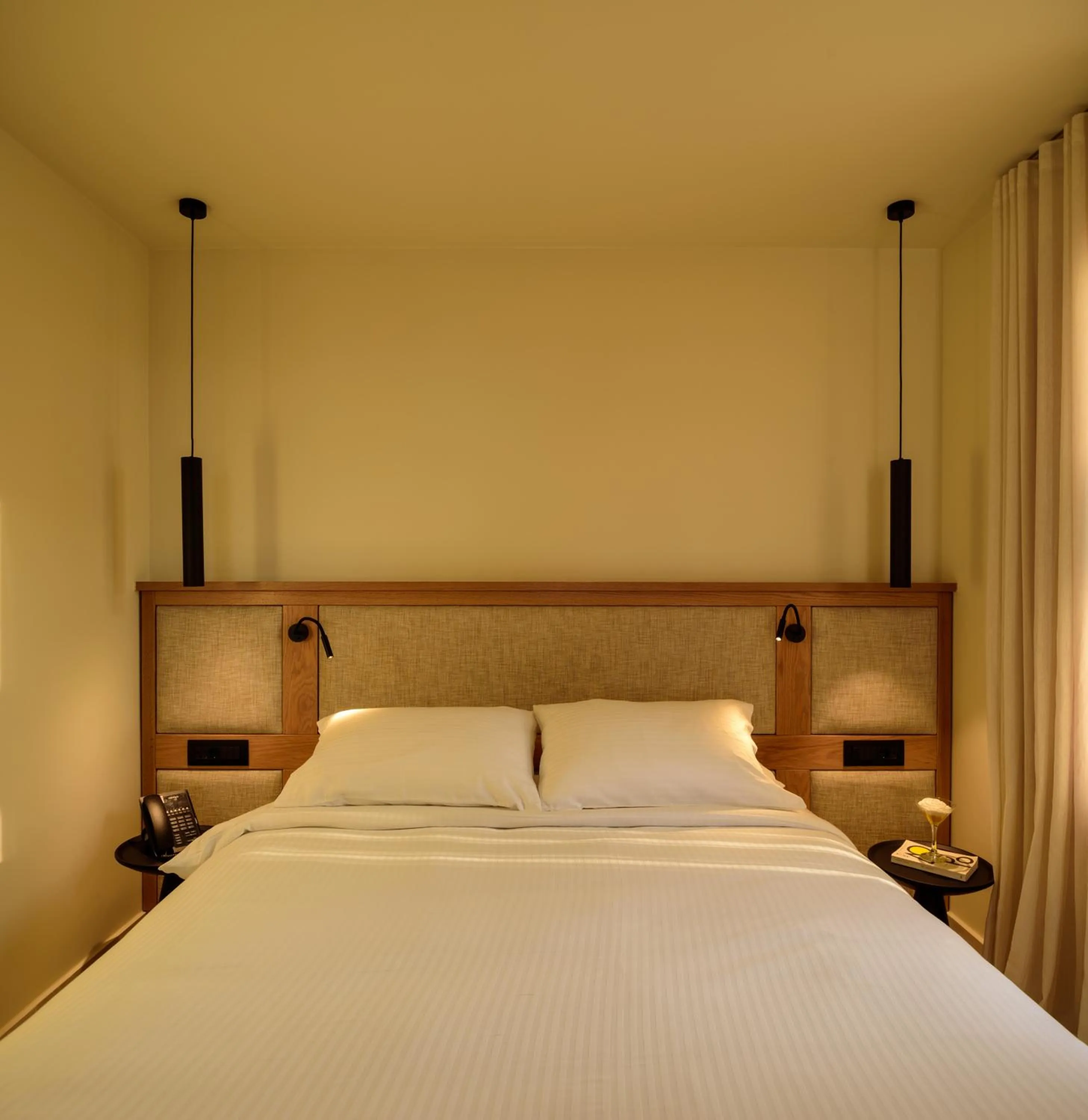 Bed in Potnia Theron Suites