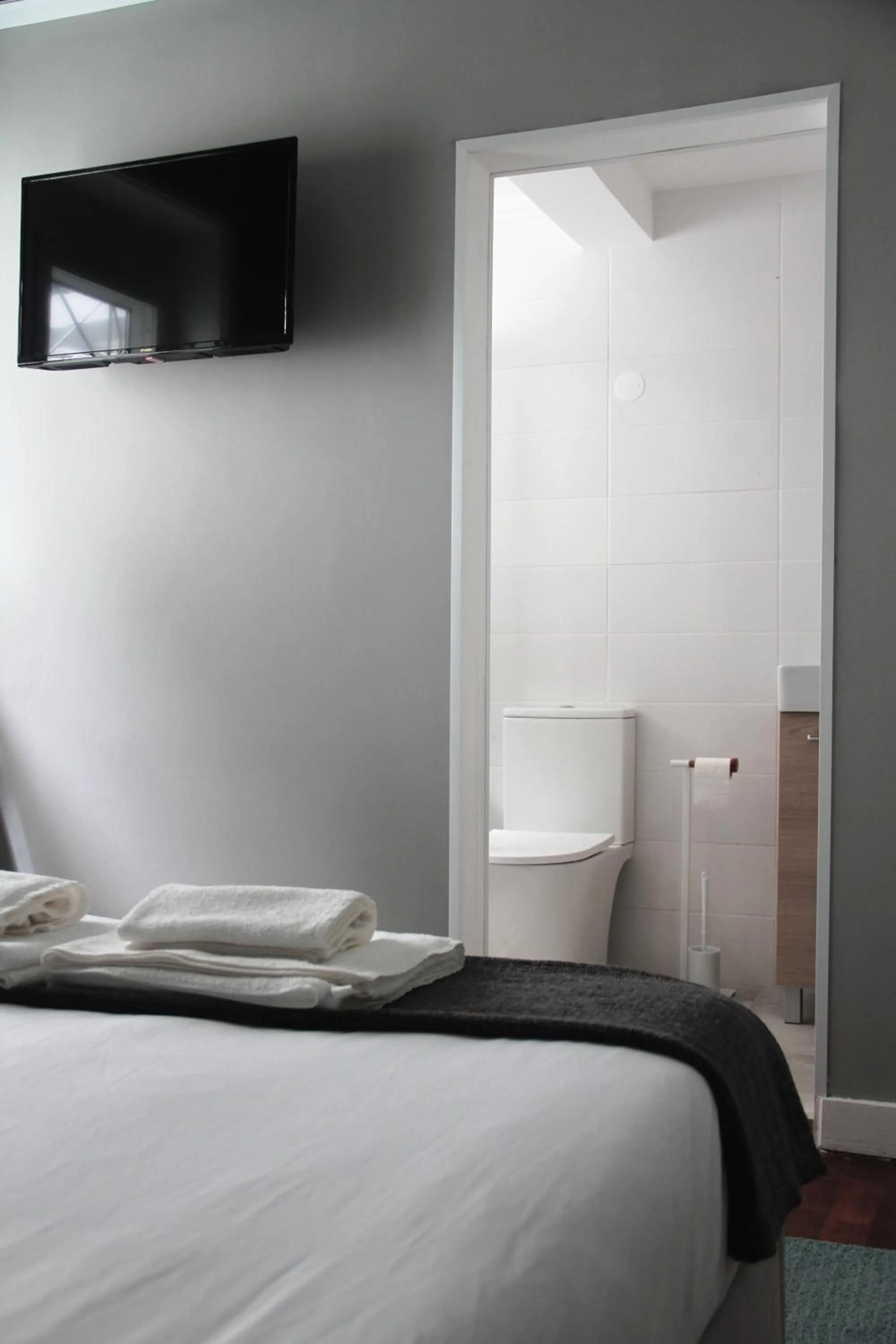 Bed in Genius Loci Guesthouse